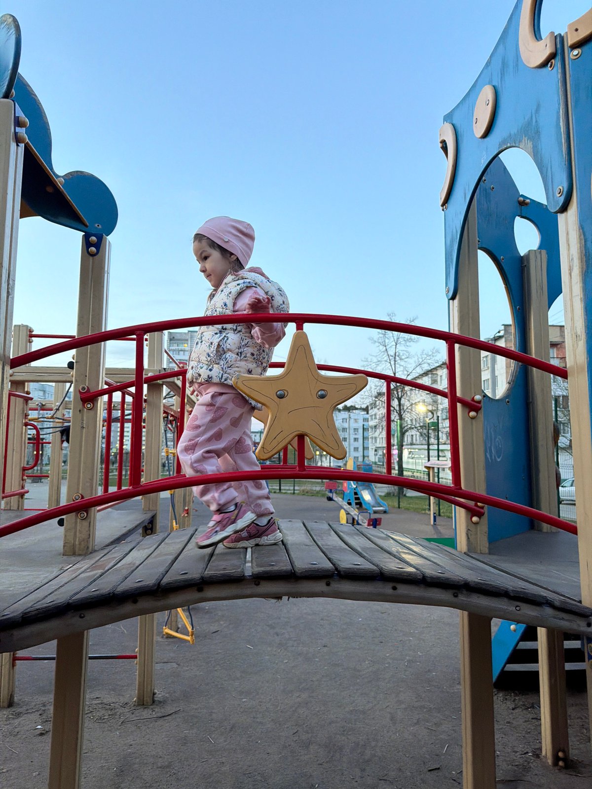Families enjoy afternoon playground activities in Chaikovsky, Russia