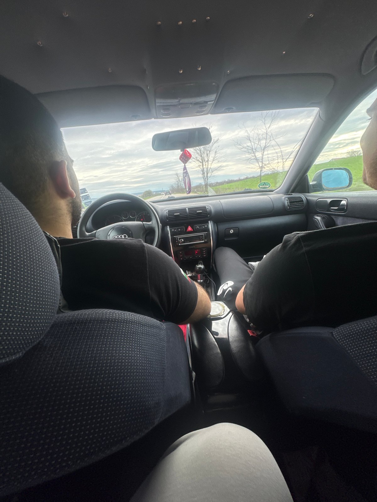 Two people photographed inside Audi in Glojene, Bulgaria