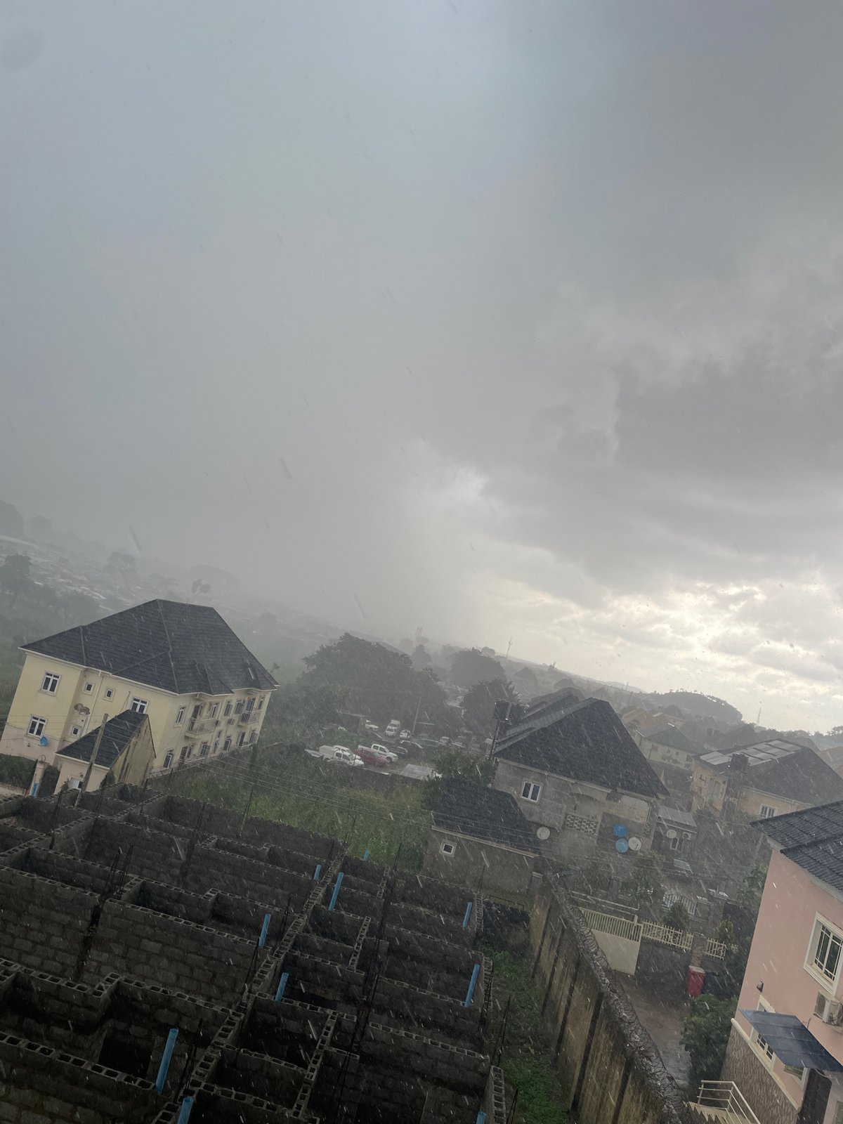 Rainy afternoon across Abuja's residential and construction zones