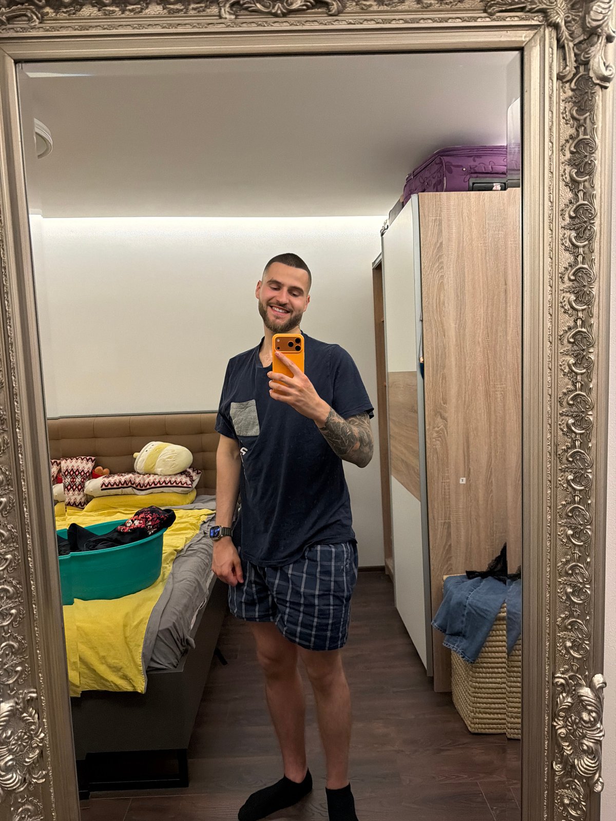 Man captured in casual indoor moments in Sofia