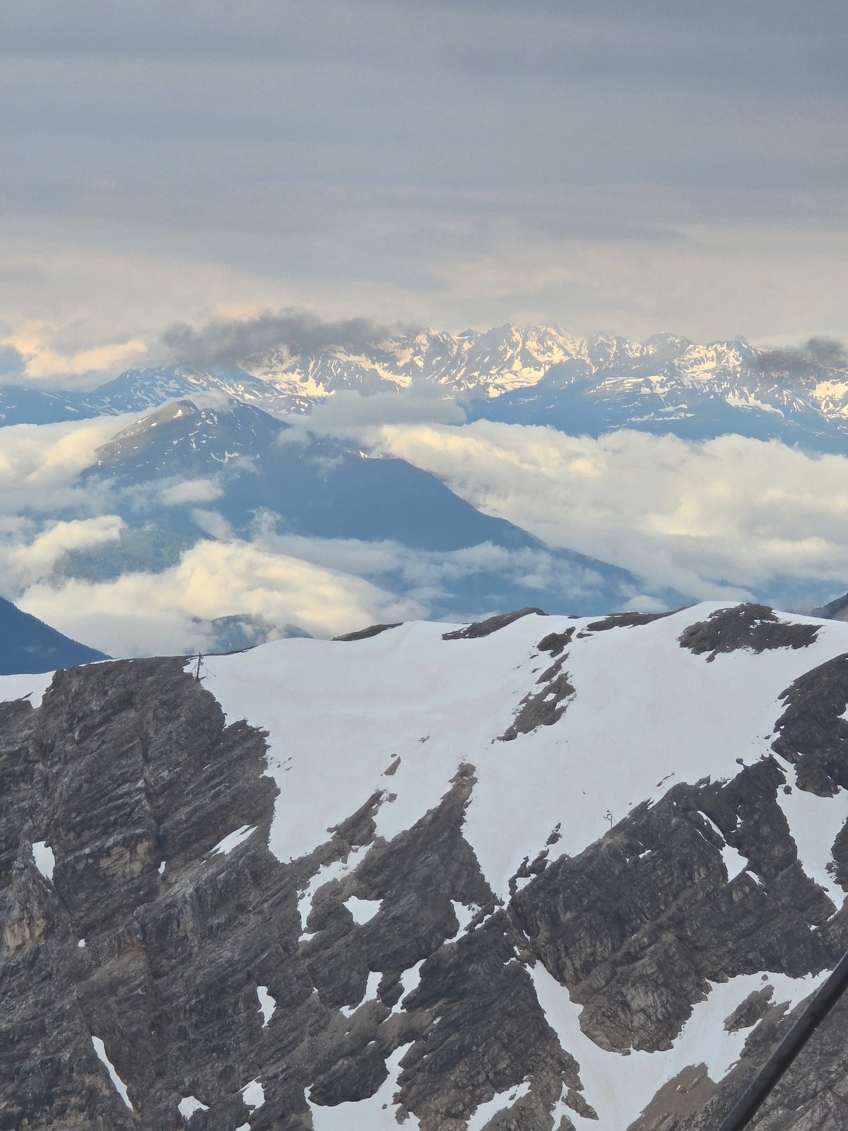 Alpine panoramas captured from German mountain peaks during morning hours