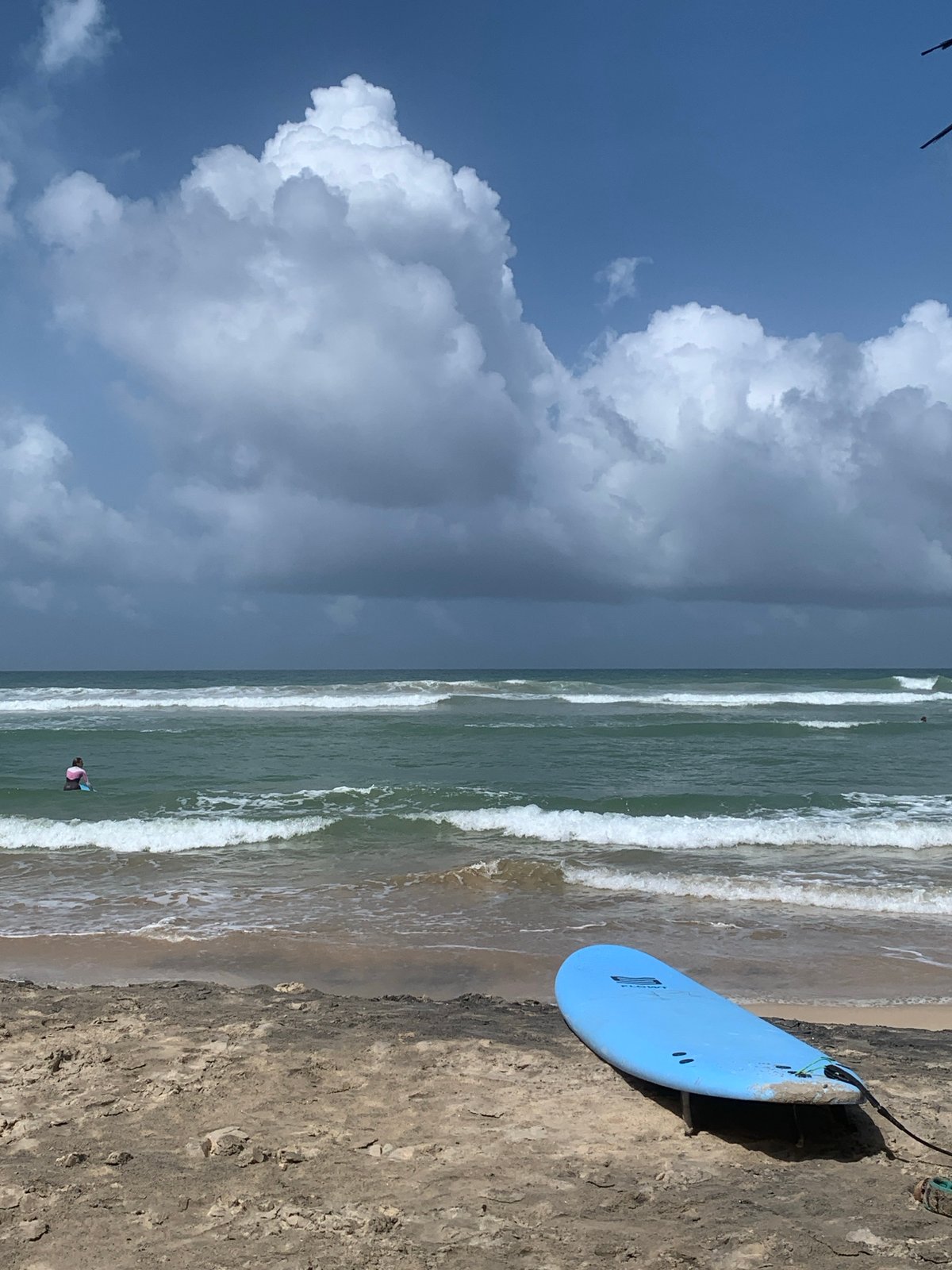 Surfboards and waves at Kathaluwa beach, Sri Lanka