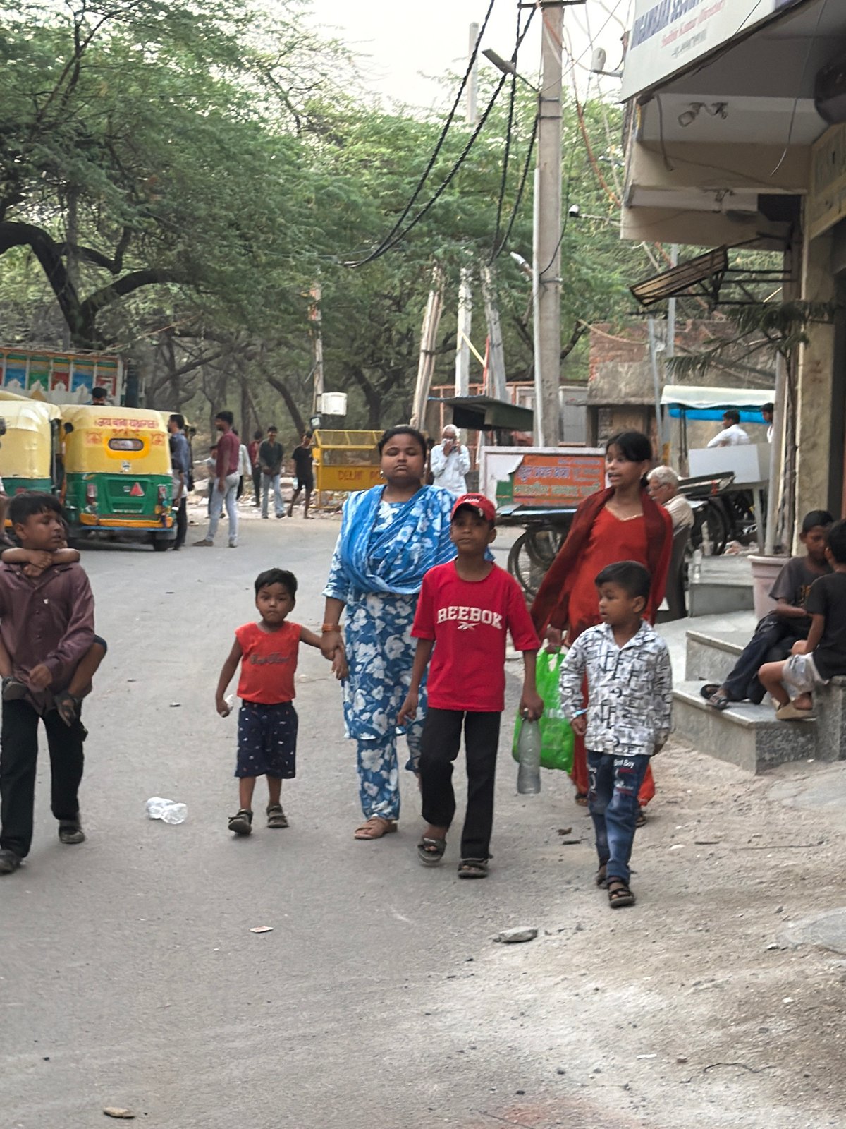 Afternoon street scenes across residential Delhi neighborhoods