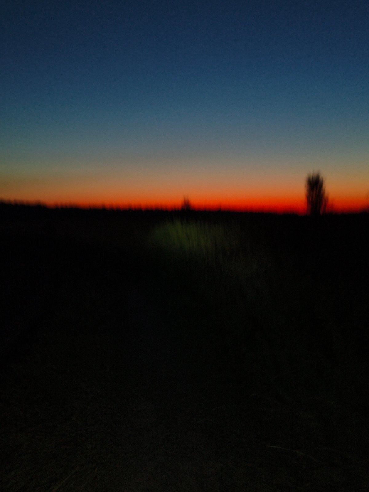 Slow dirt-path ride at sunset, sky going full orange
