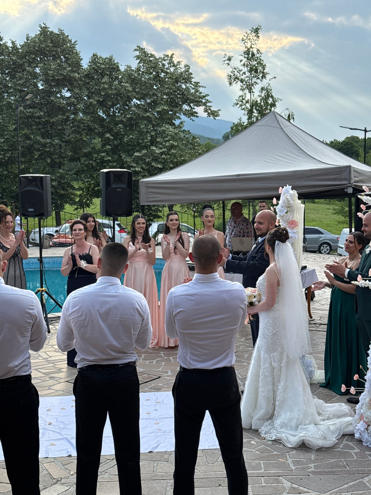 Wedding ceremony held outdoors in Debrashtitsa, Bulgaria
