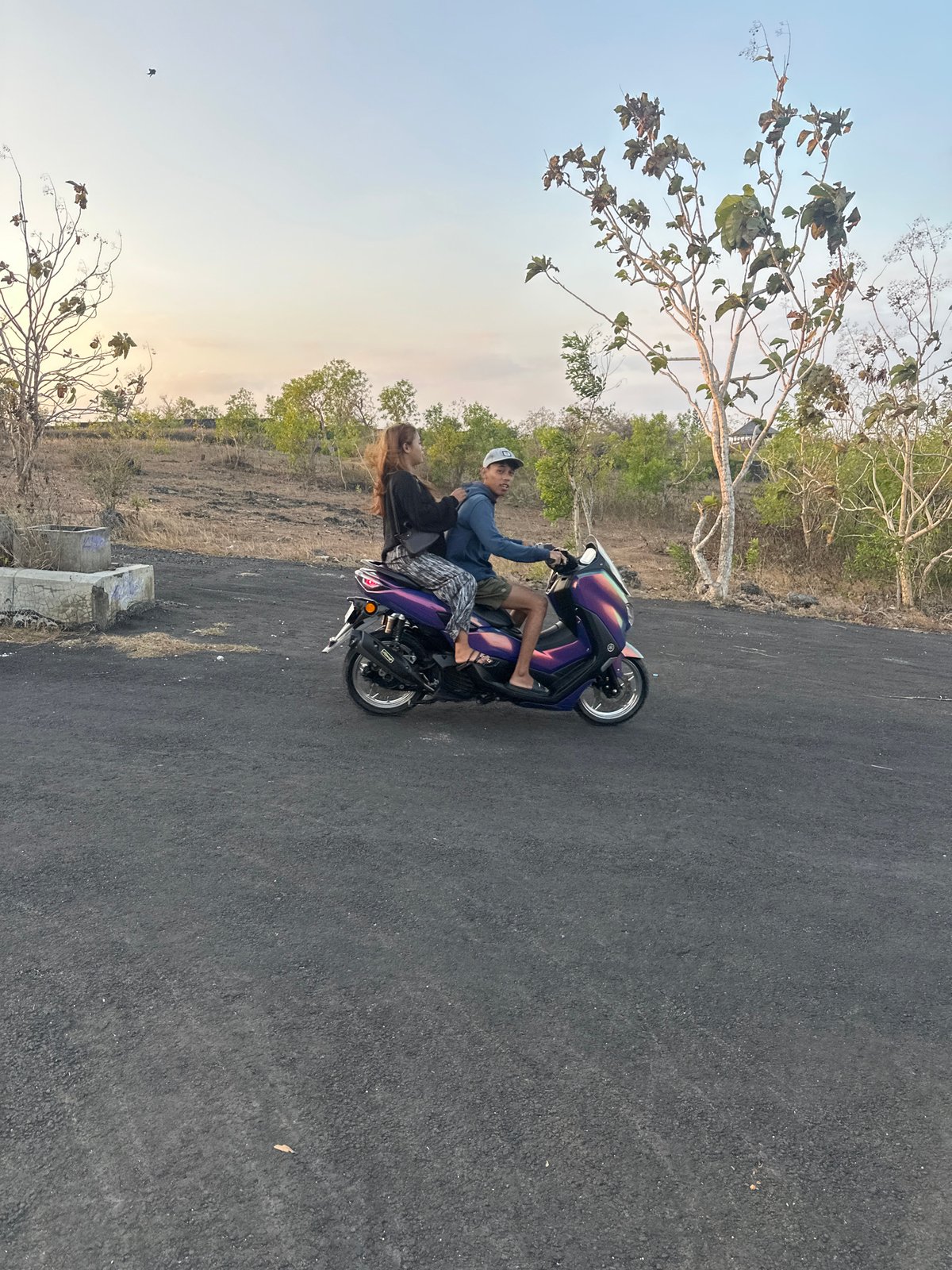 Scooter crew hangs around Garuda Wisnu Kencana, Bali
