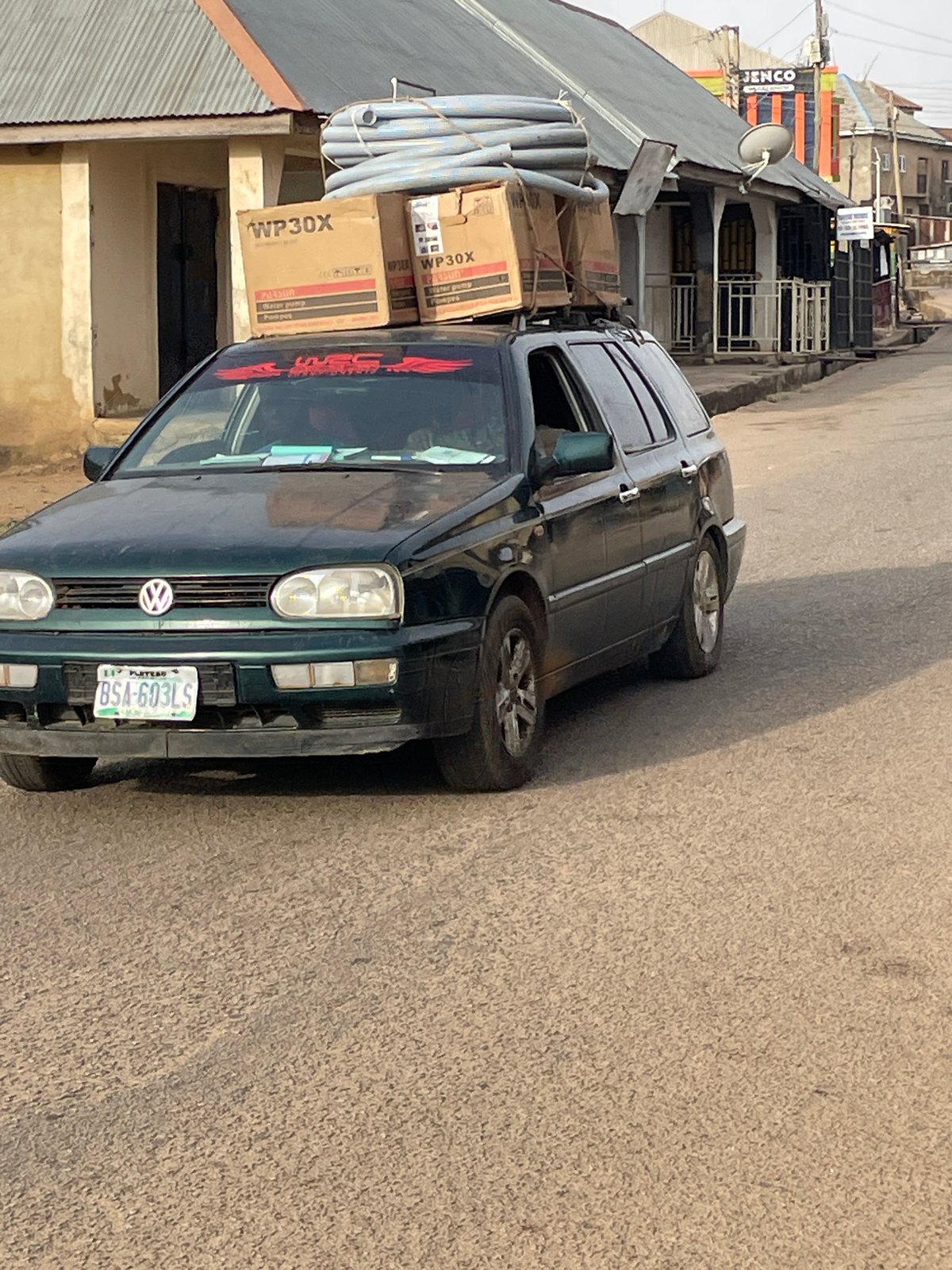 Morning street life documented across Jos, Nigeria neighborhoods