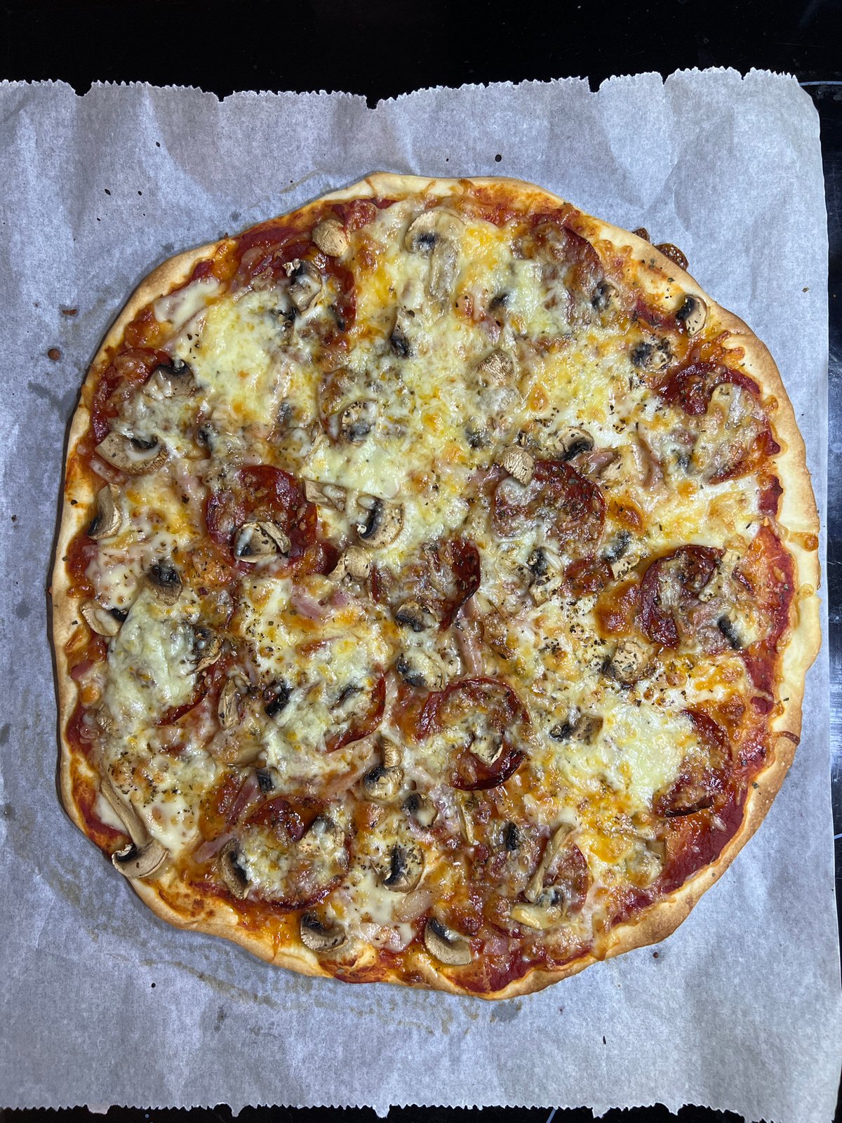 Fresh pizza prepared and seasoned in Mollet Del Vallès