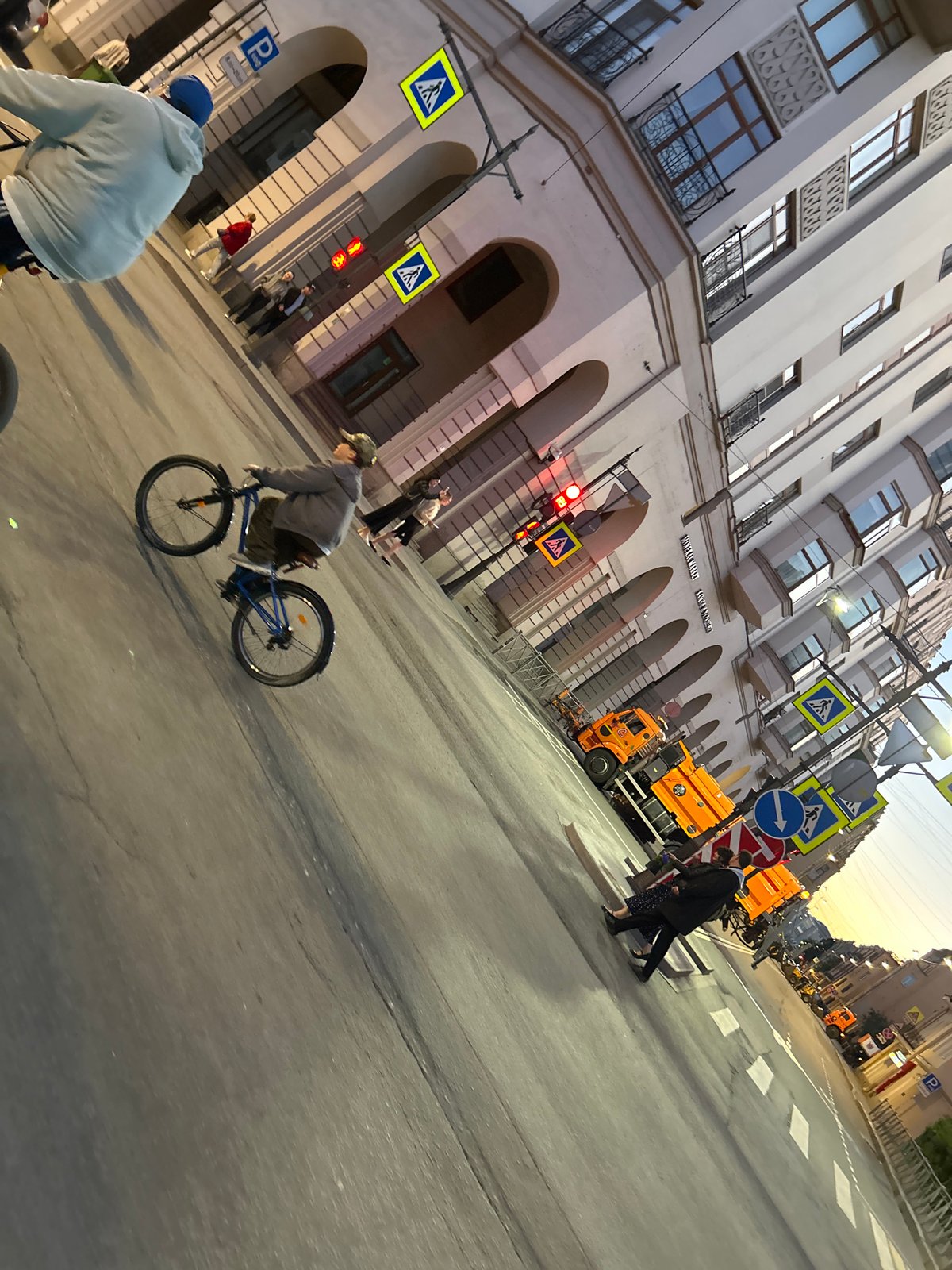 Dusk in a European city: bikes, trams, and street life