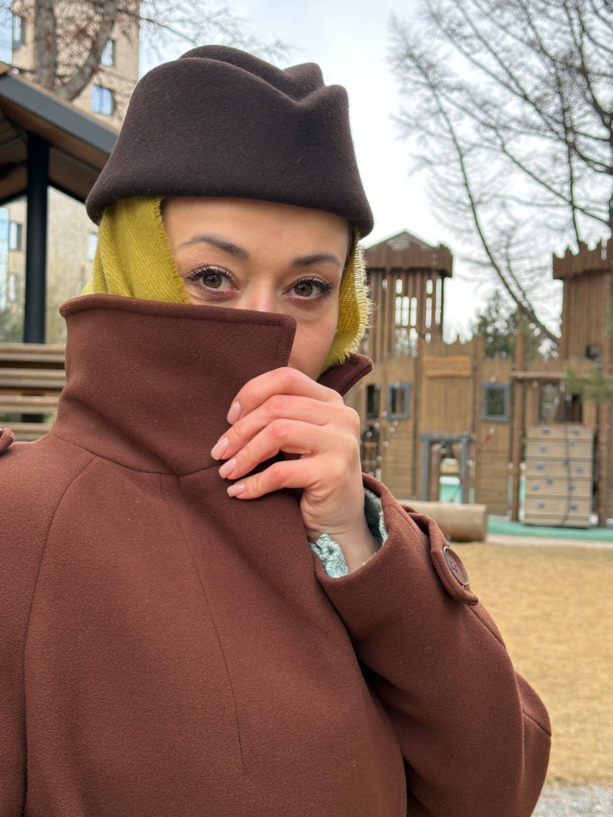 Woman photographed during morning walk through Krasnoyarsk park