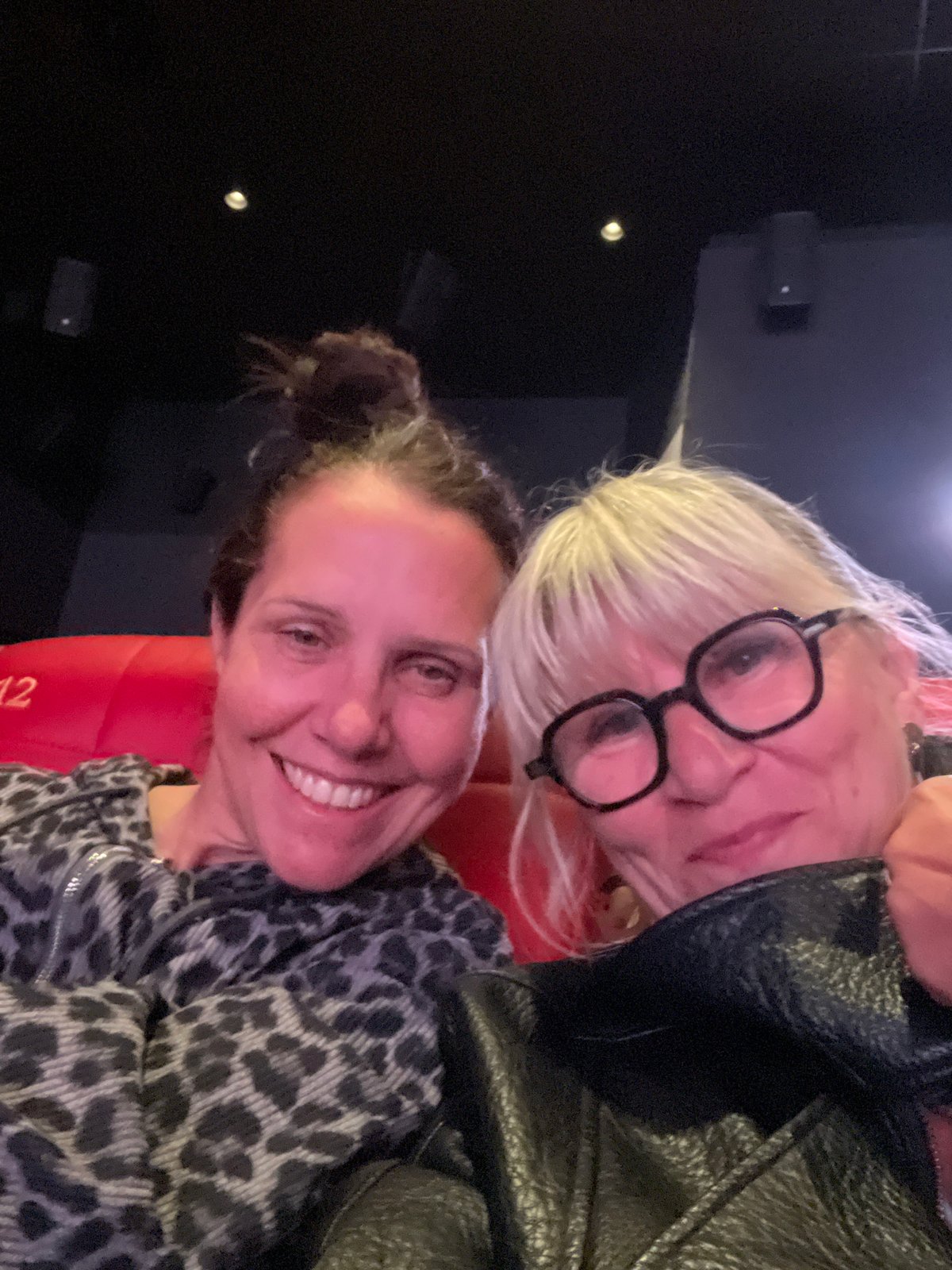 Moviegoers take selfies in Saint-Just-Saint-Rambert theater