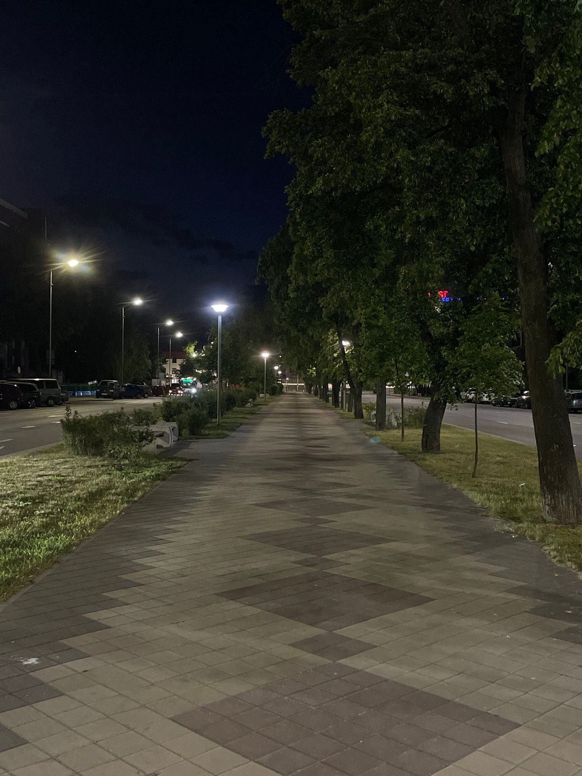 Illuminated pedestrian walkway documented in Brest, Belarus at night