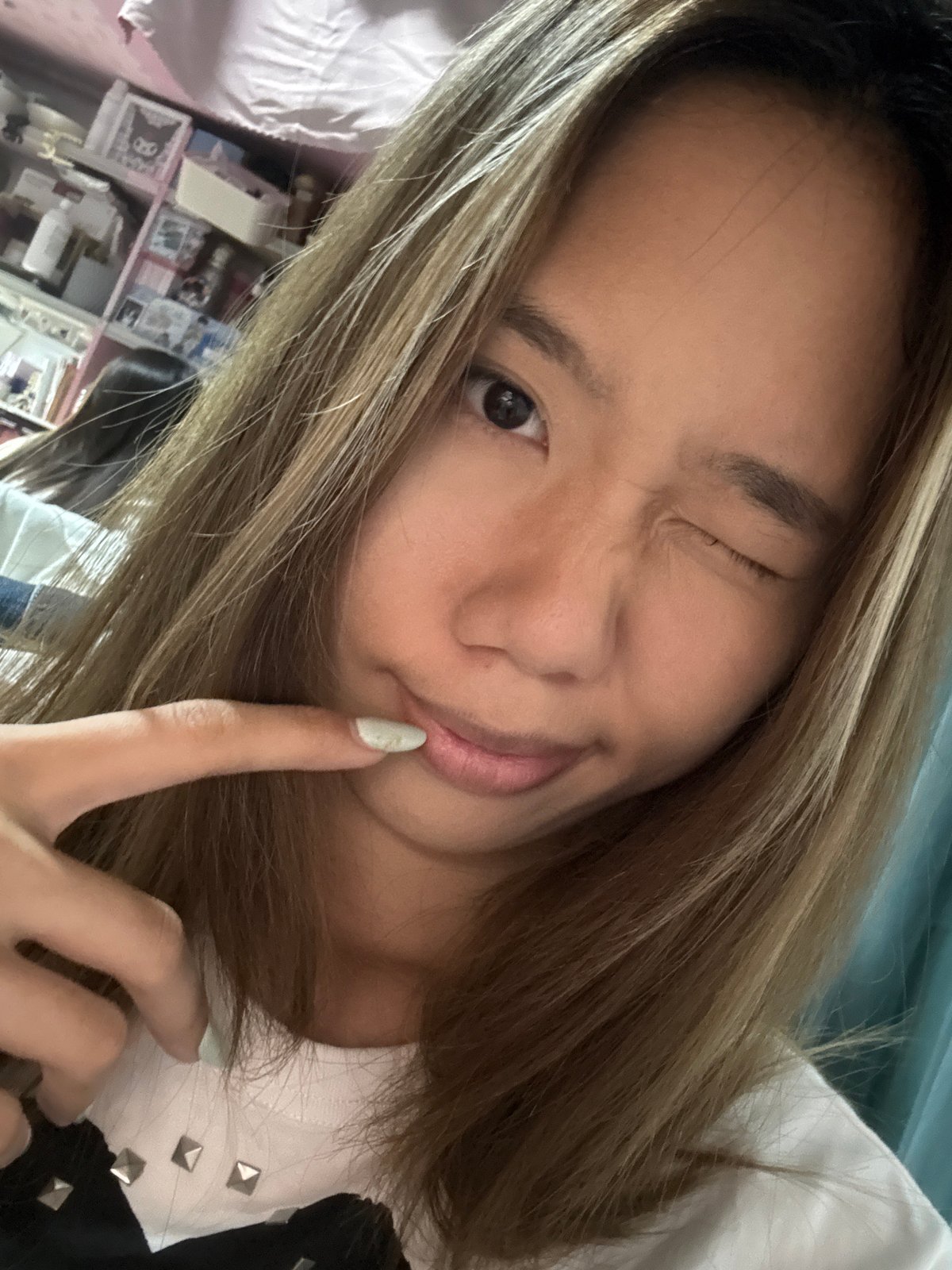 Woman takes playful selfies in Nan'an District