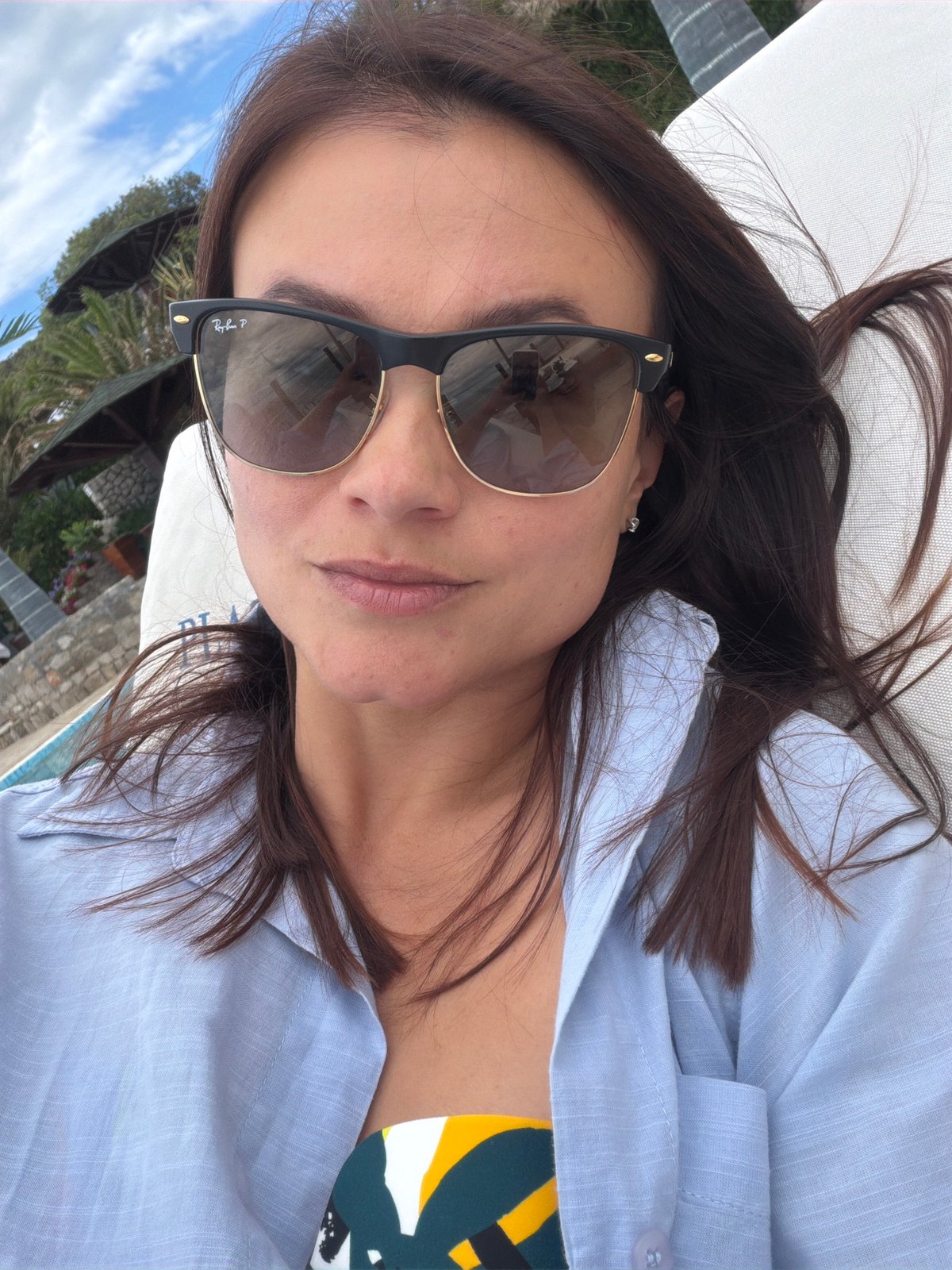 Woman enjoys leisurely Sunday afternoon by Montenegro coast