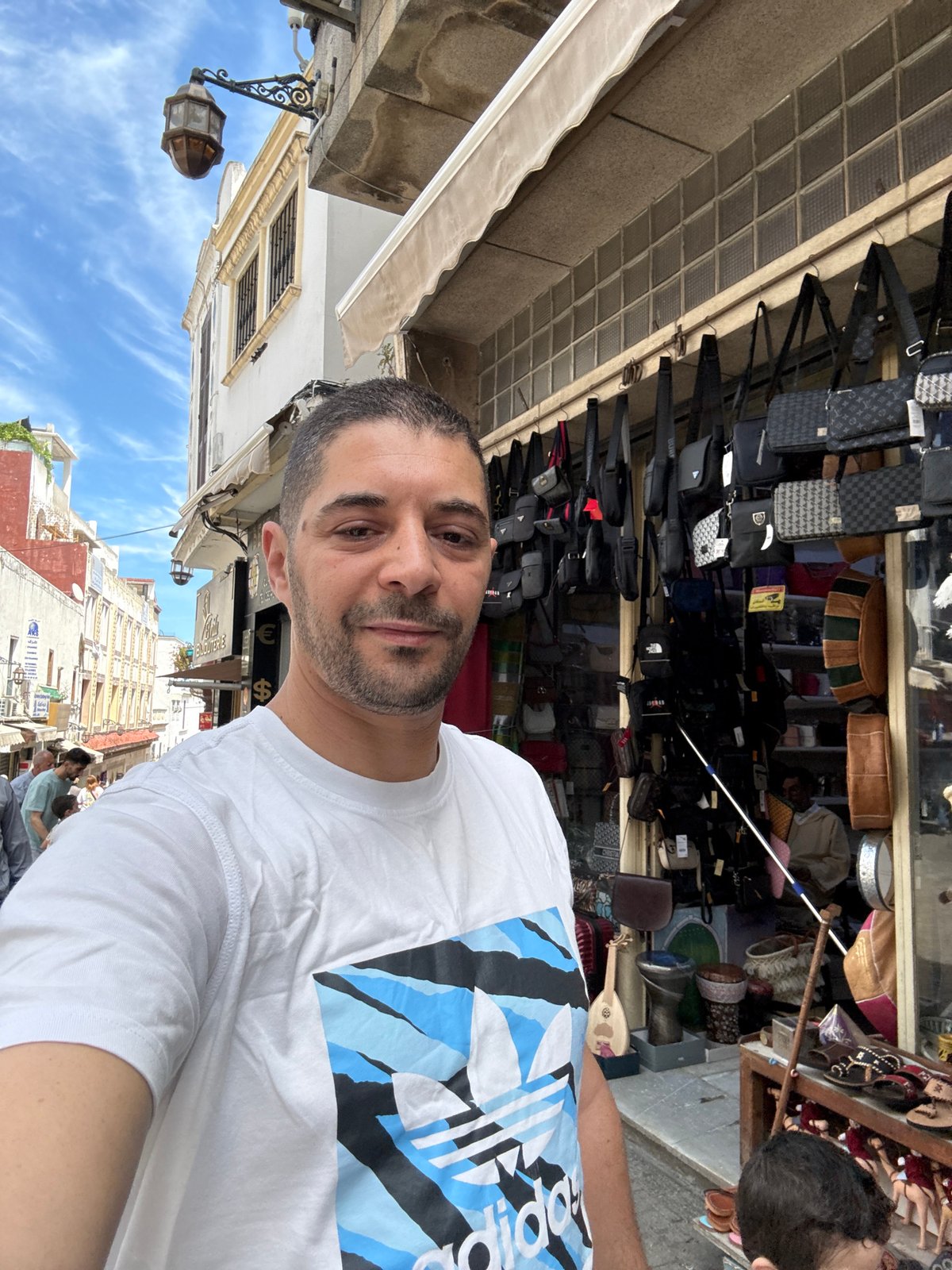 Ordinary afternoon scenes documented in Tangier's bustling medina district