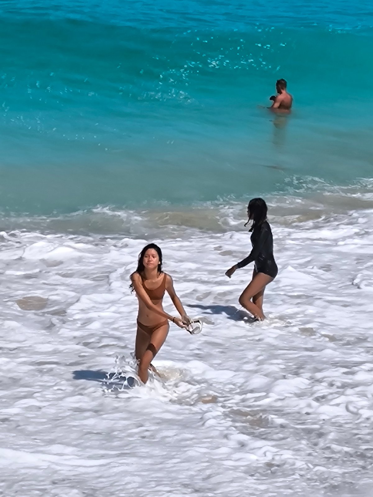 Busy afternoon on a Kuta Selatan beach, Bali
