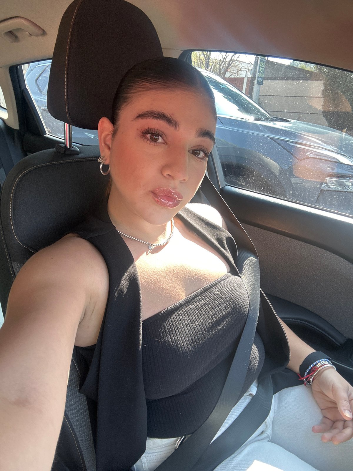 Woman photographed in car in Puebla, Mexico