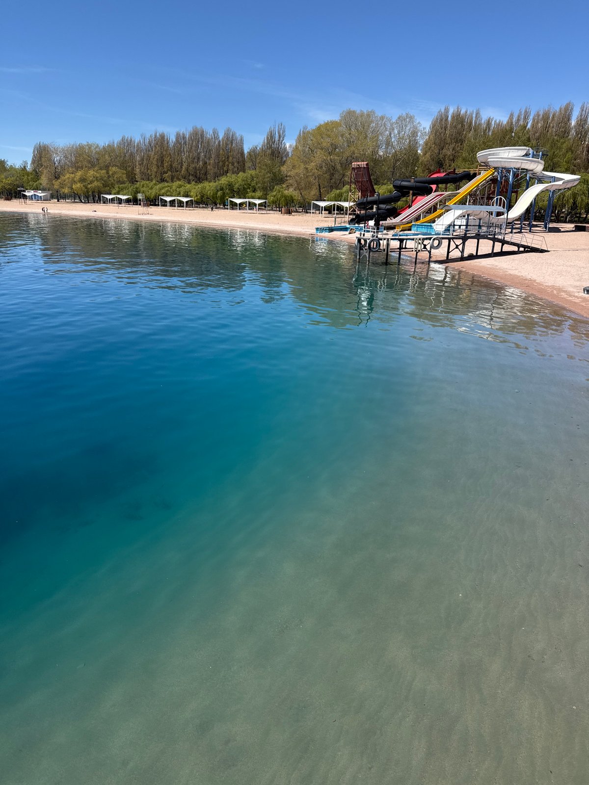 Morning lakeside tourism documented at Kyrgyzstan's Lake Issyk-Kul resort
