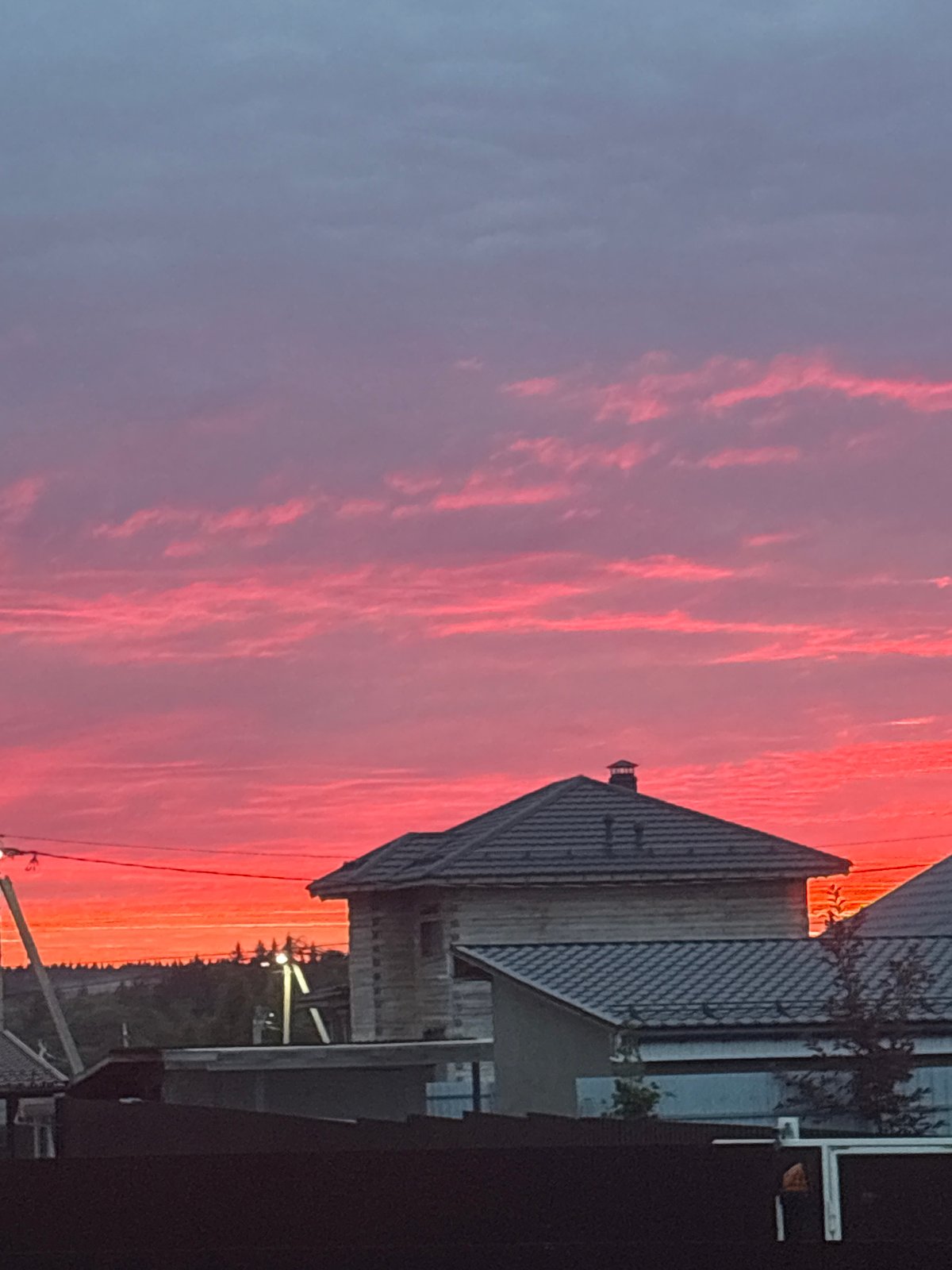 Vivid sunset lights up the rooftops of Dolce Vita KP