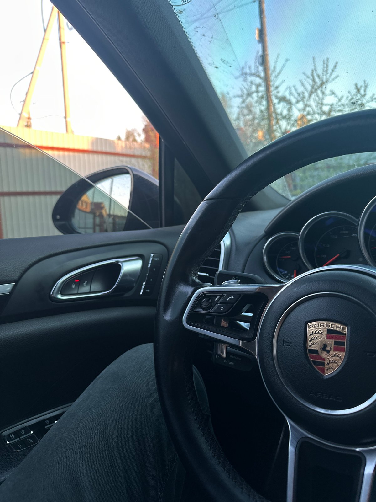Porsche interior and lakeside building documented in dual memories