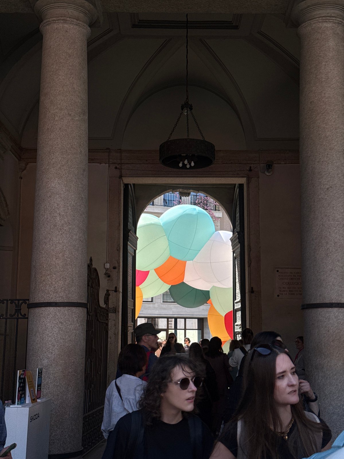Colorful inflatable art installation draws crowds to historic Milan courtyard