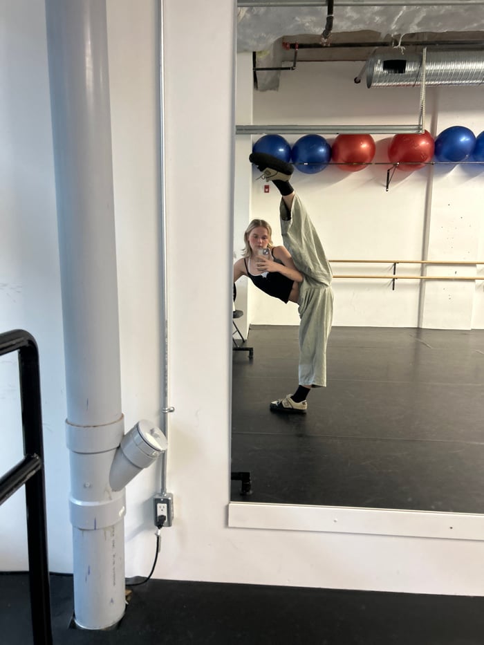 Woman Takes Fitness Studio Selfies During Evening Workout Session