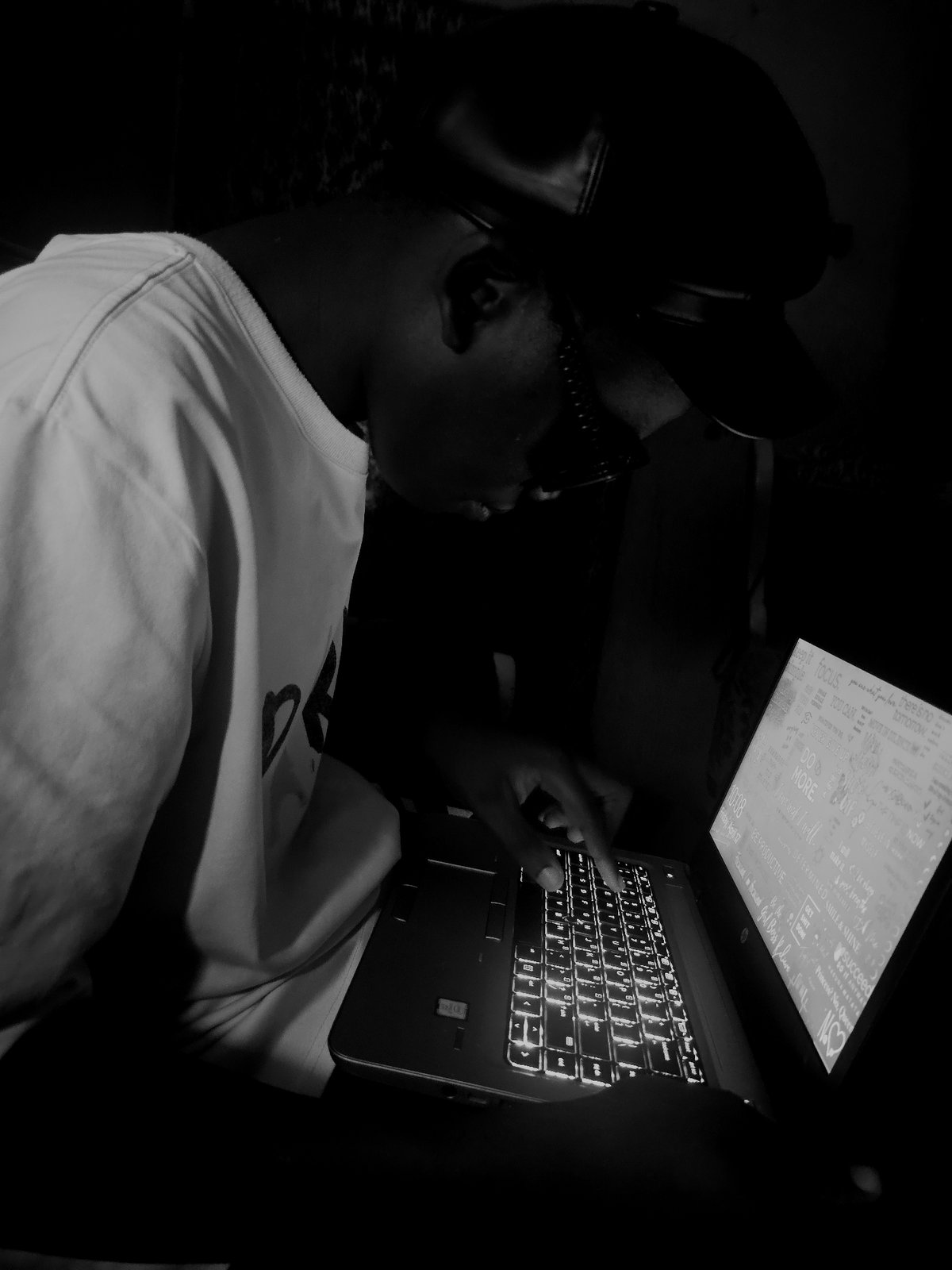 Person uses laptop, pours liquid overhead in Asaba residence