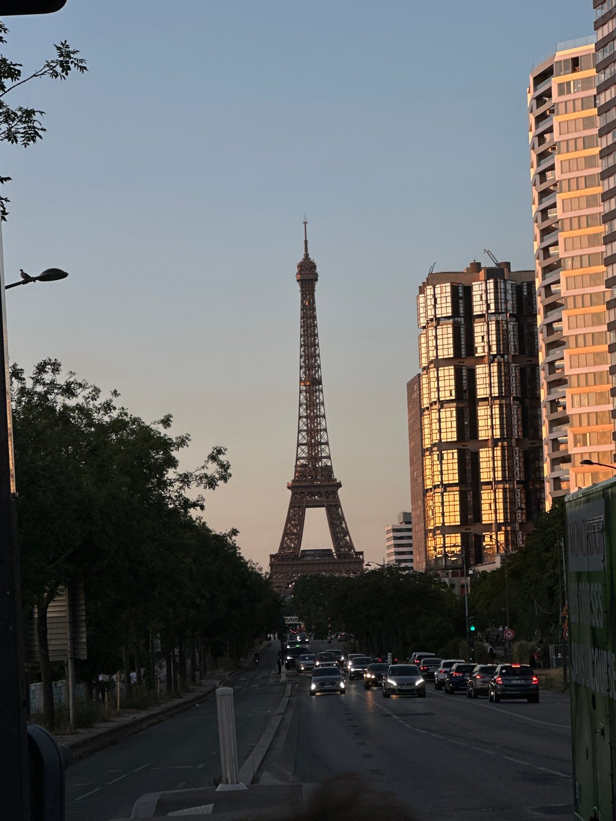 Golden hour in Paris: classic facades meet a rising glass tower