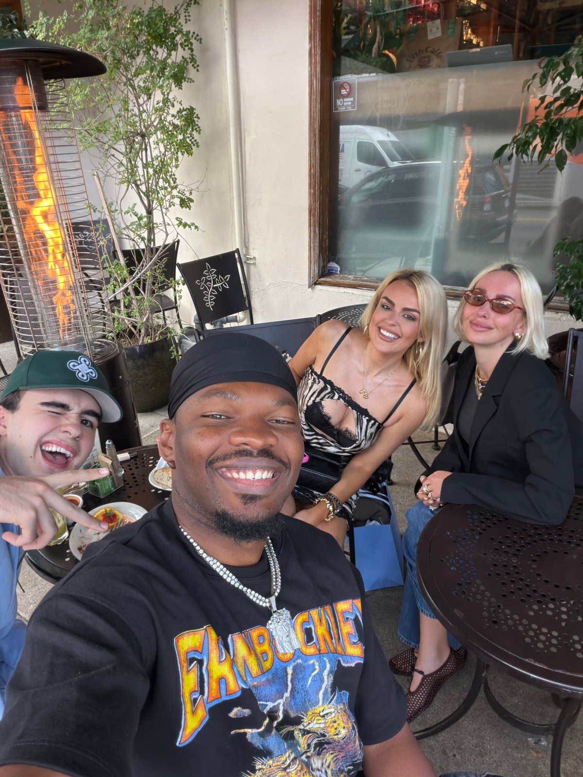 Four friends take late-night selfie at West Hollywood restaurant