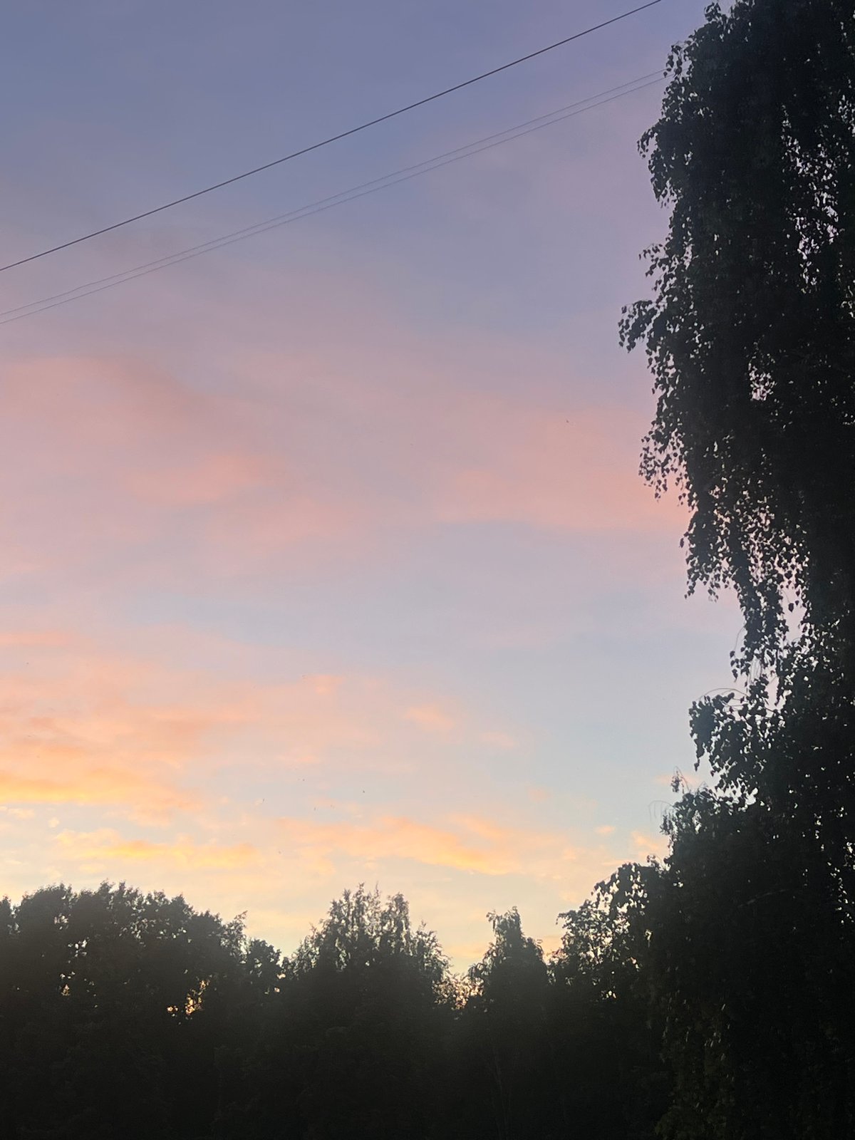 Summer solstice sunset along the Kama River in Chaikovsky