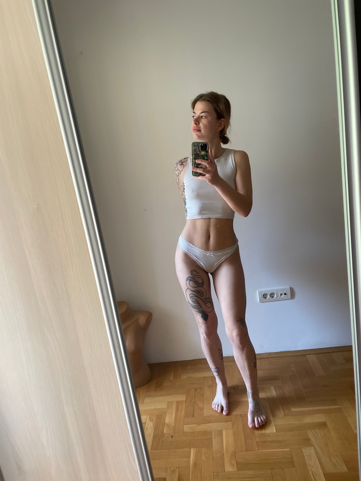 Woman takes mirror selfie in Boreti, Montenegro