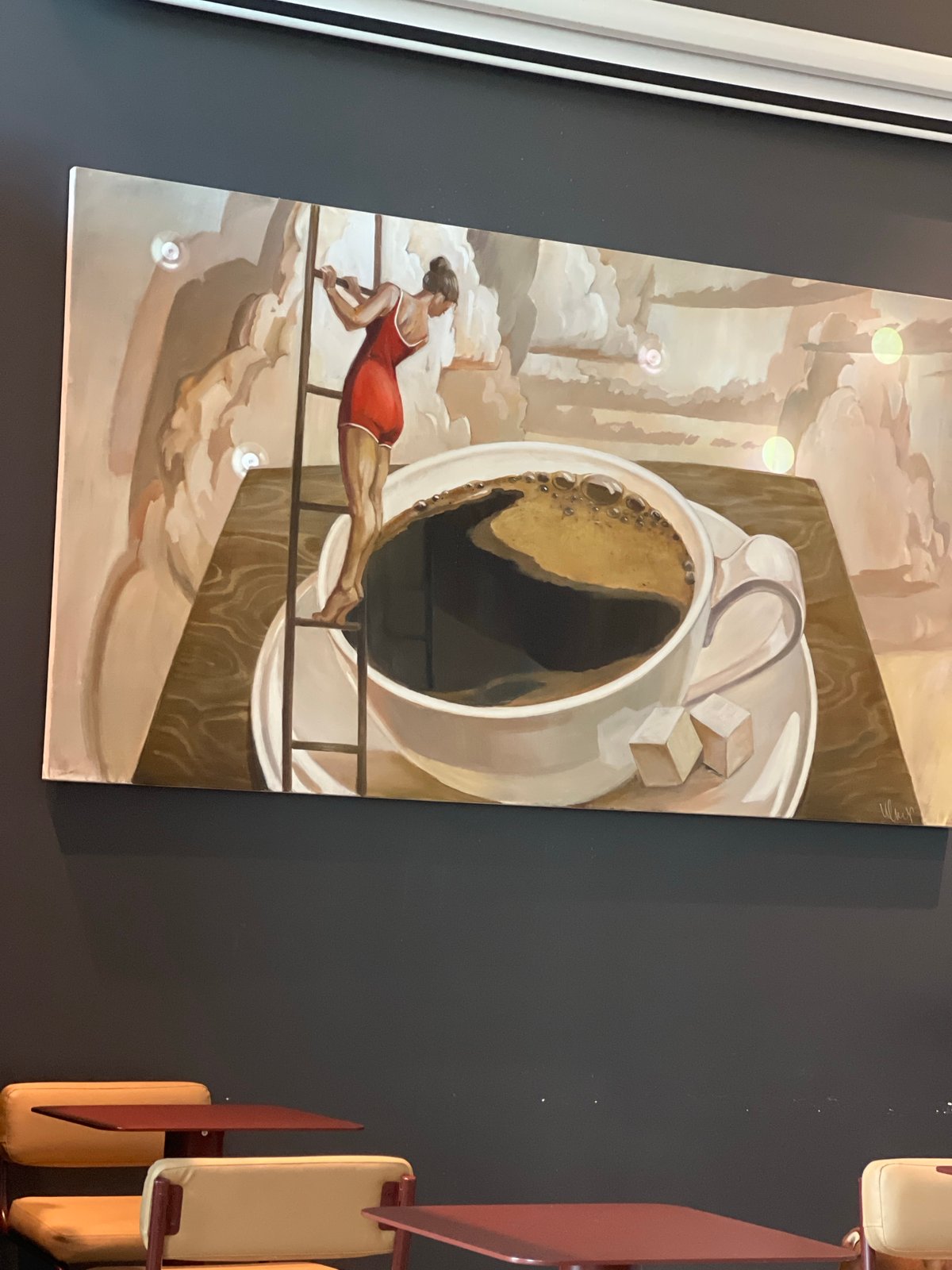 Surreal coffee cup artwork observed in Khimki residence