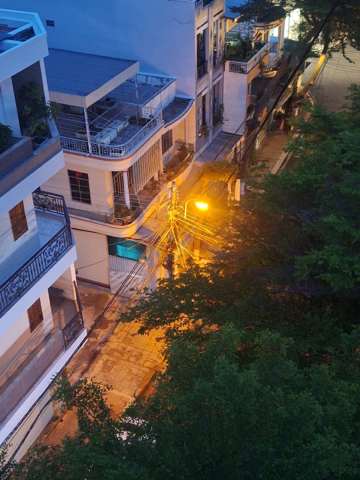Nha Trang skyline at dusk, rooftops to coastline