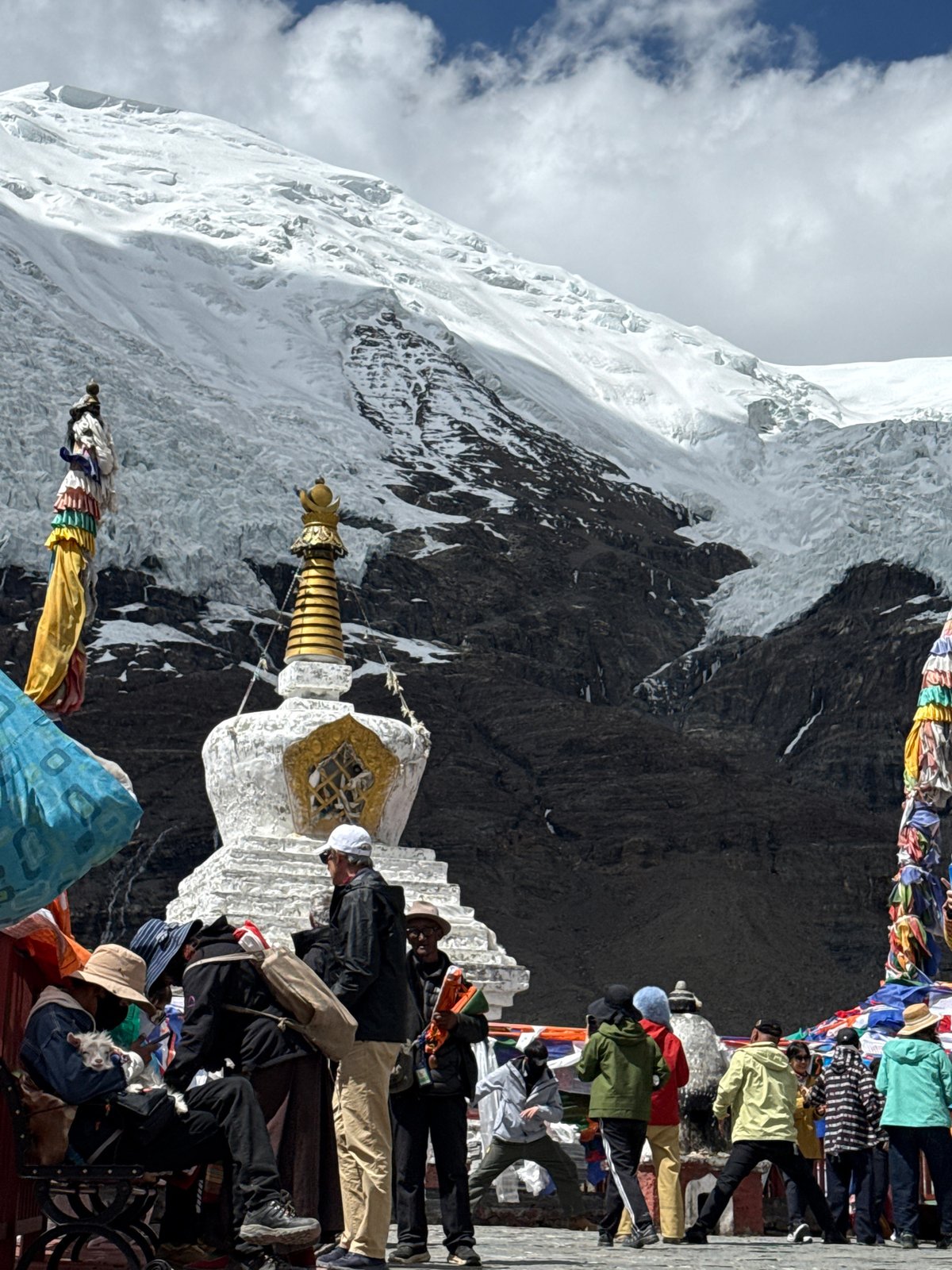 Buddhist stupa observed amid snowy mountains in Gyantse County
