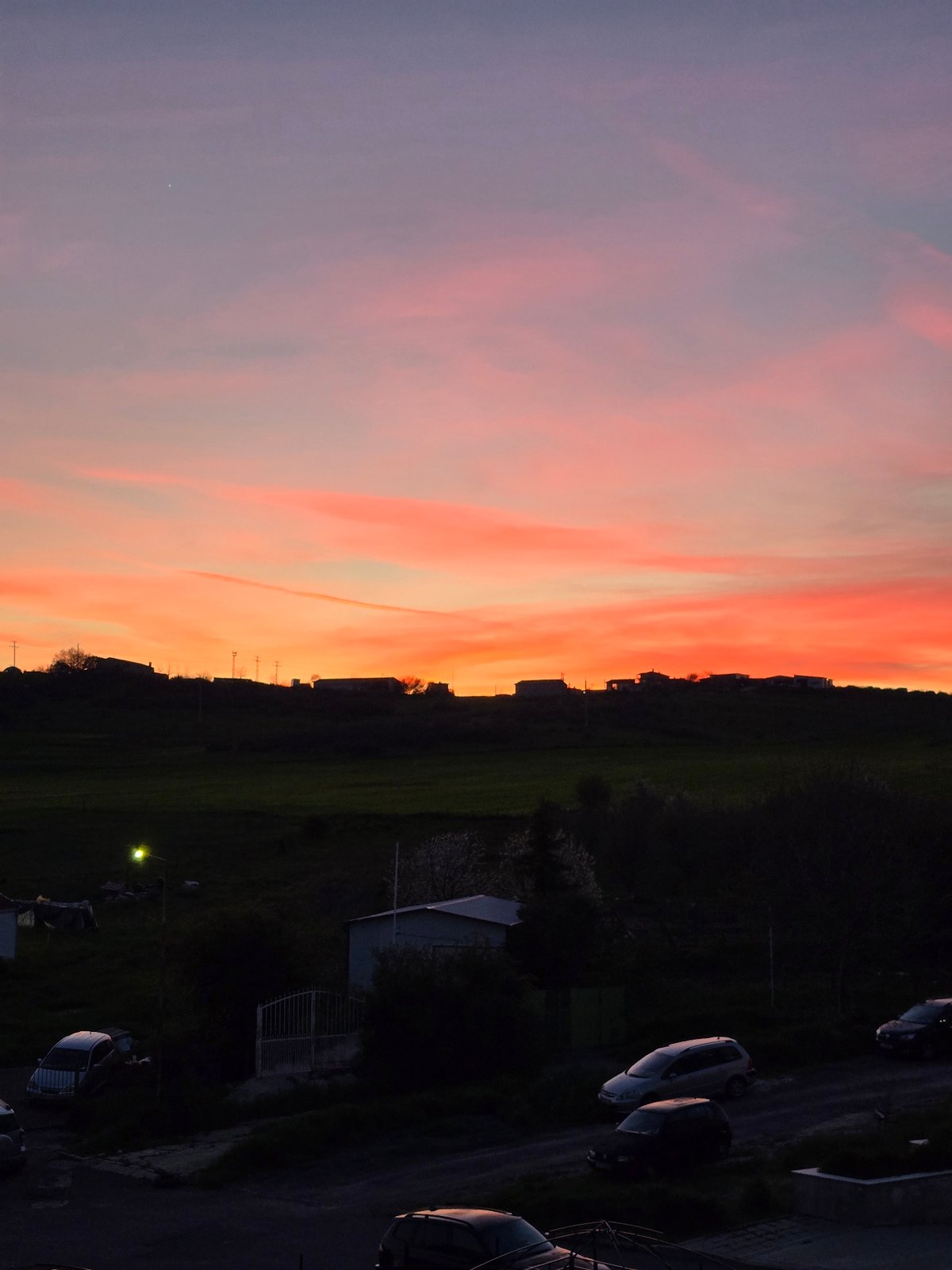 Vibrant sunset illuminates Burgas, Bulgaria skyline Friday evening