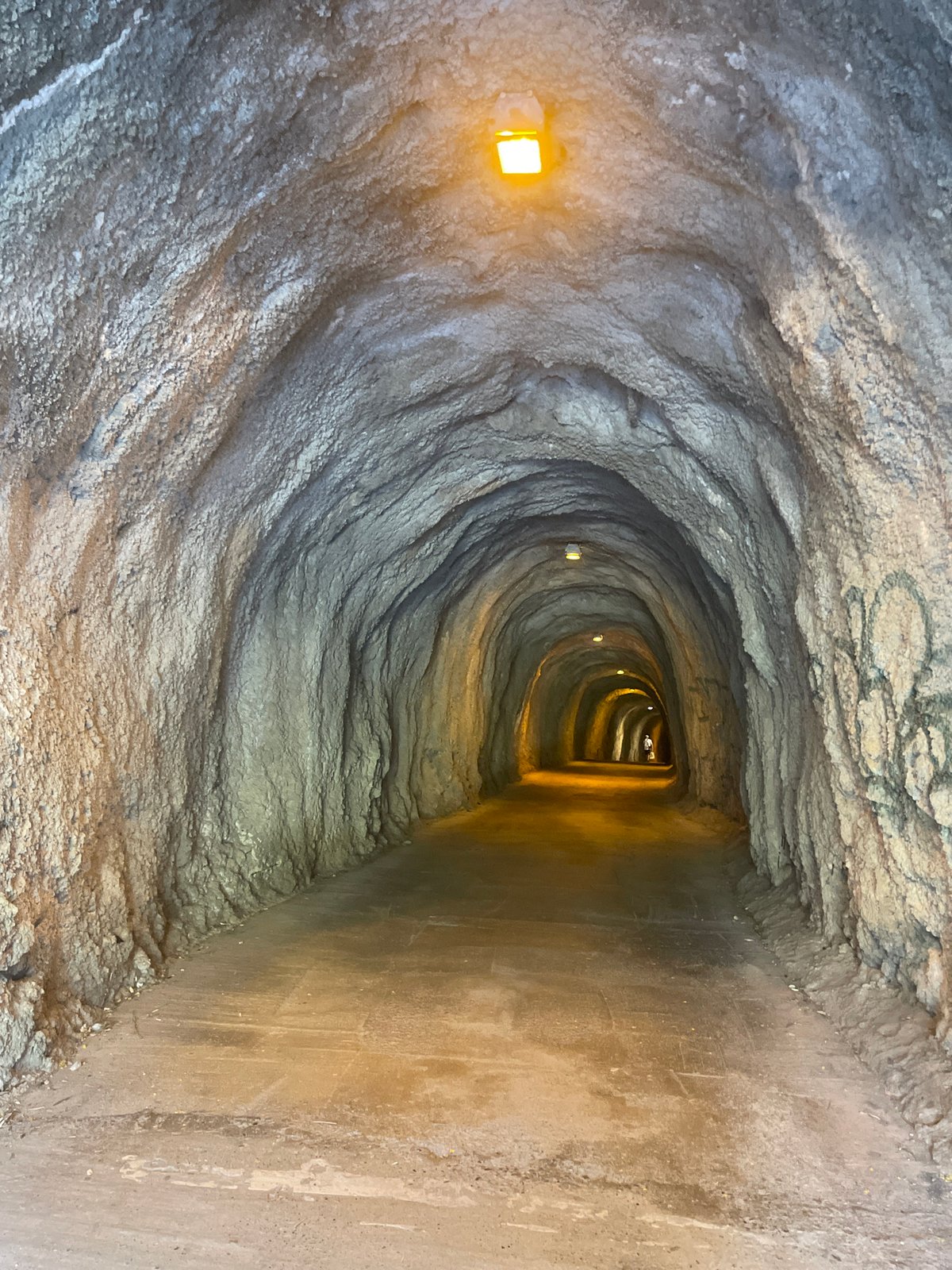 Illuminated tunnel with textured walls documented in Kamenovo, Montenegro