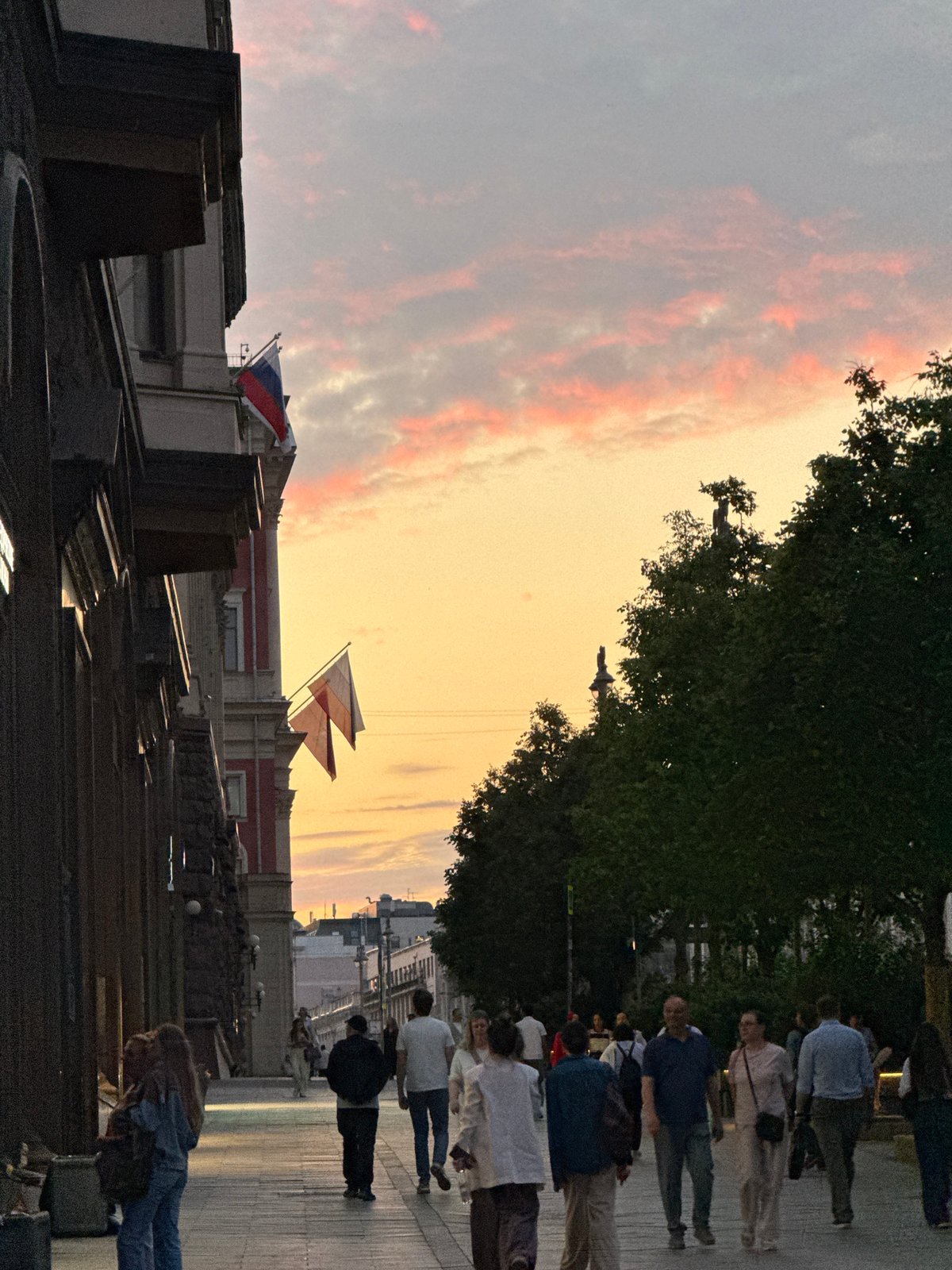 Evening street life documented across central Moscow landmarks