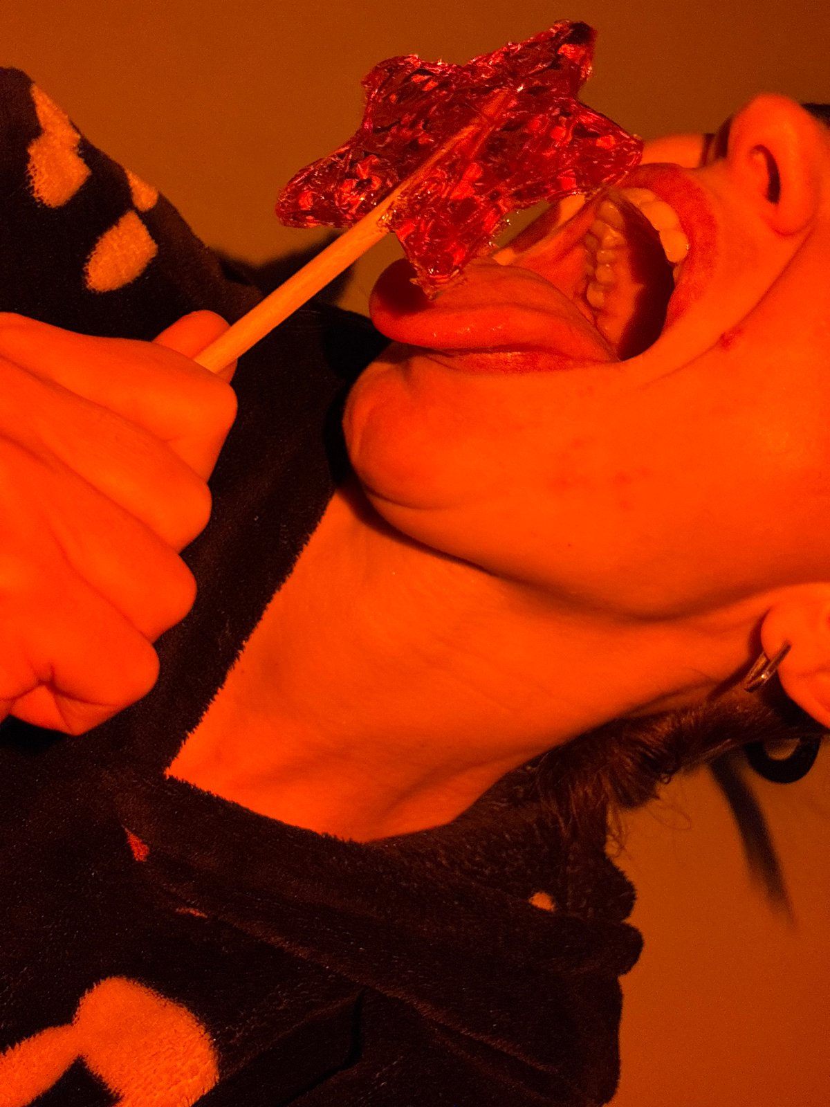 Woman photographed enjoying star-shaped lollipop in Russia