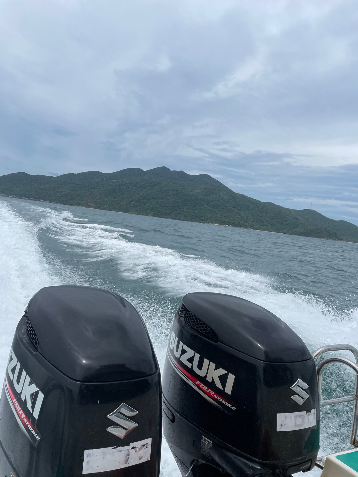 Twin Suzuki outboards powering through the South China Sea