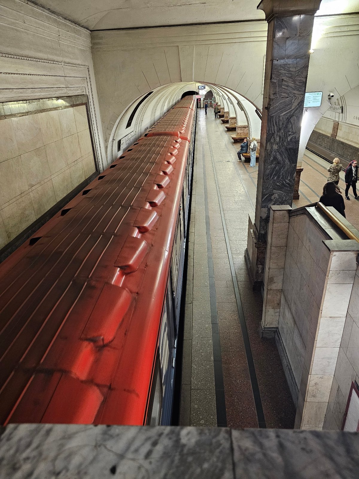 Red train spotted at marble Moscow Metro station