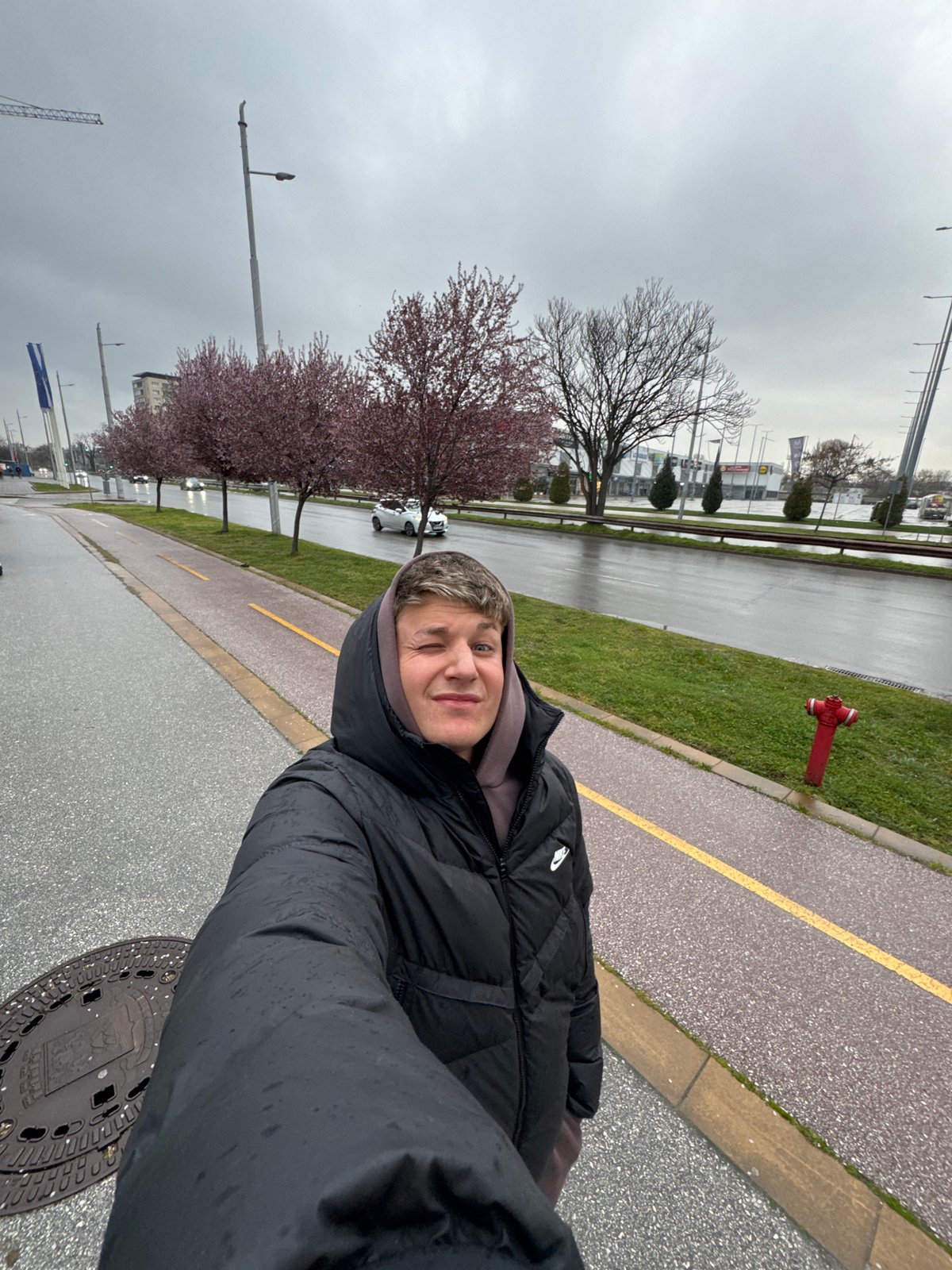 Early morning selfies taken on rainy Plovdiv street