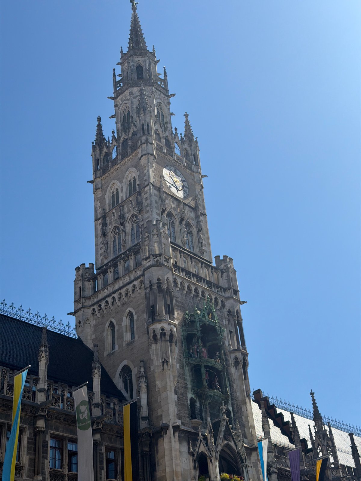 Up-close look at Munich's Neues Rathaus on a clear summer morning