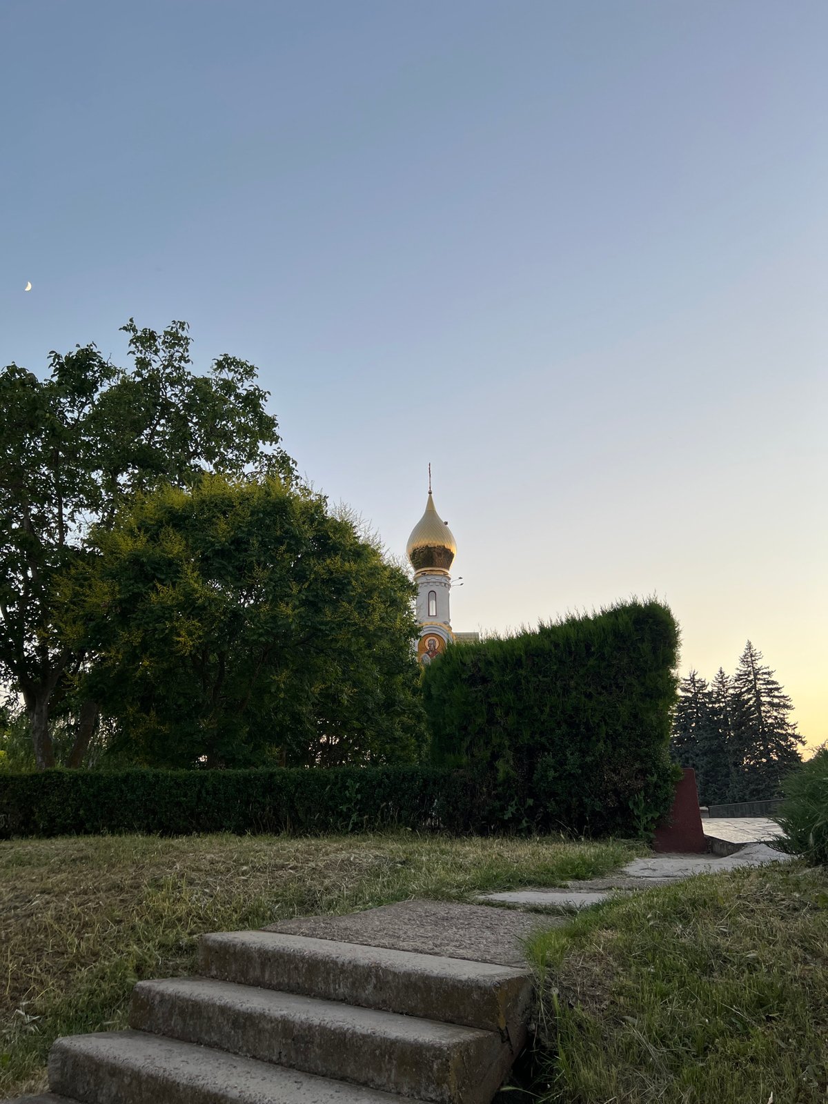 Summer evening along Tiraspol's riverside promenade and city park