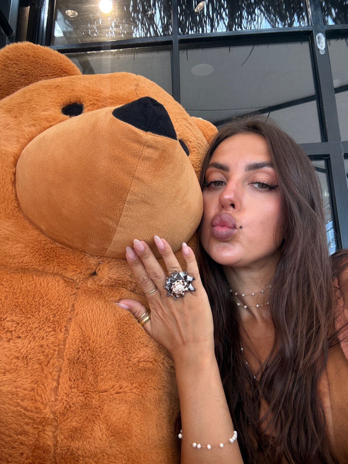 Café afternoon in Fethiye with a giant orange teddy bear