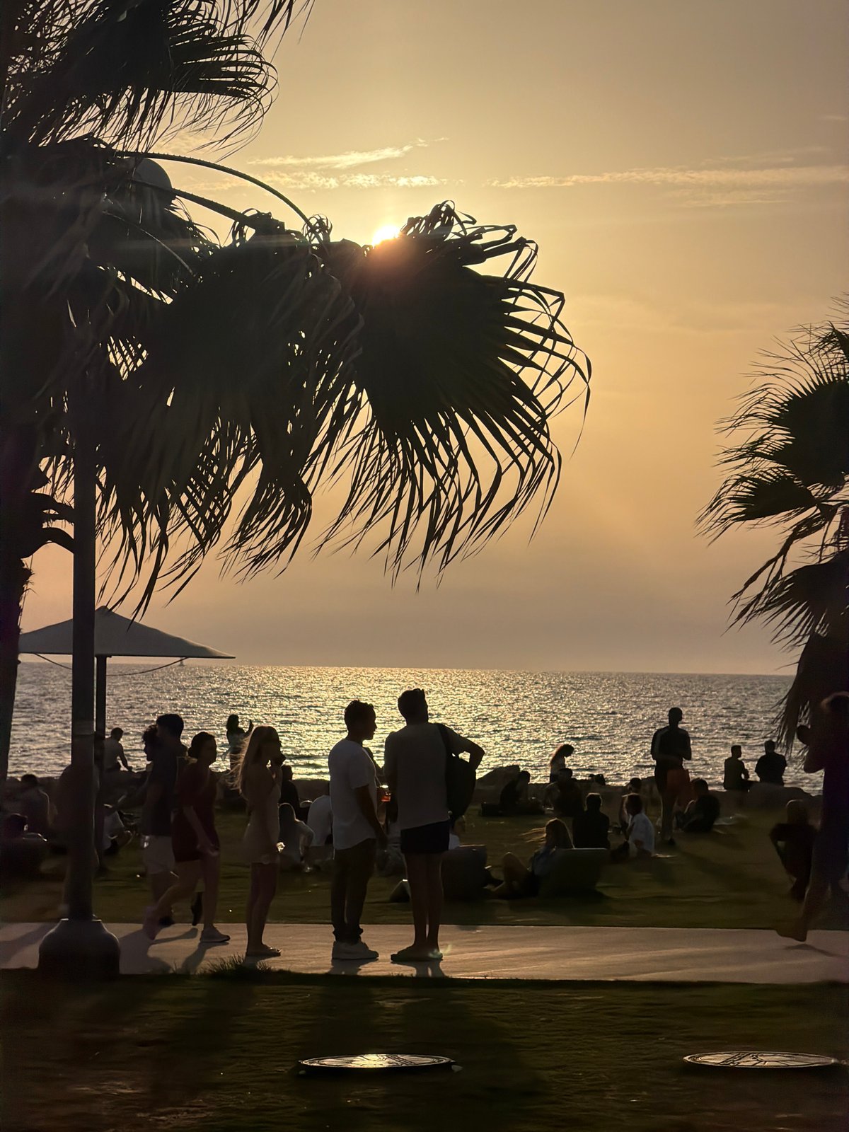 Sunset documented along Tel-Aviv coastal promenade