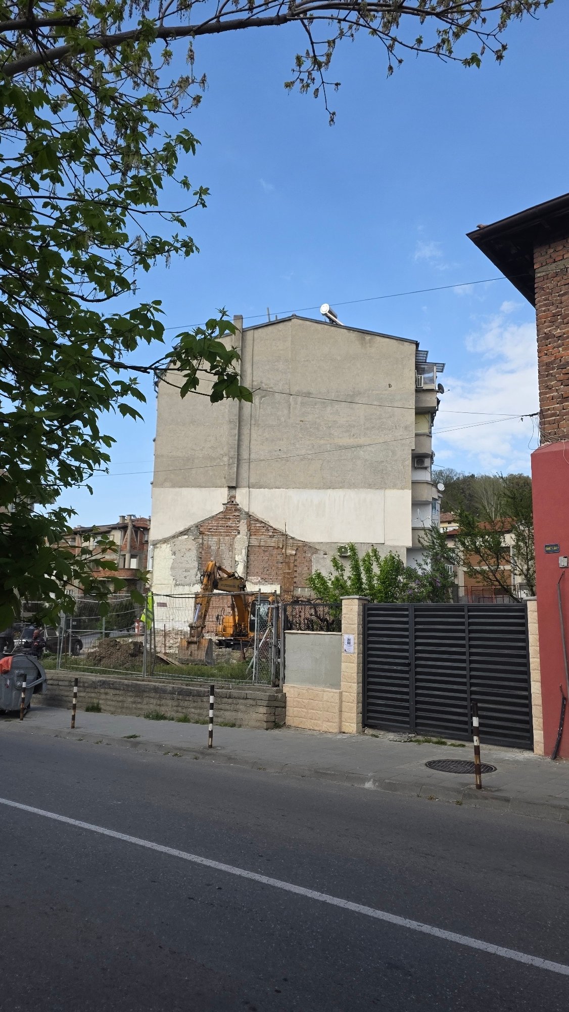 Daily life documented across Blagoevgrad, Bulgaria including demolition, pets