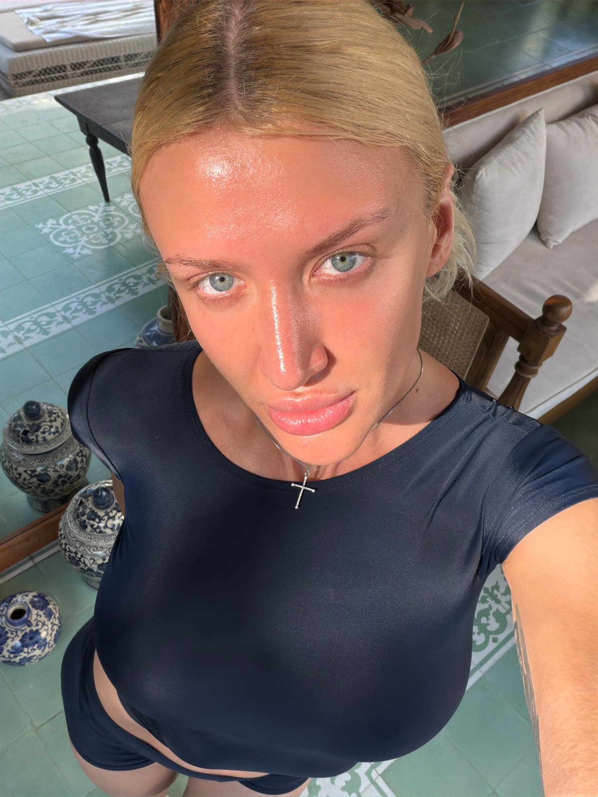Woman takes multiple selfies in North Kuta, Indonesia