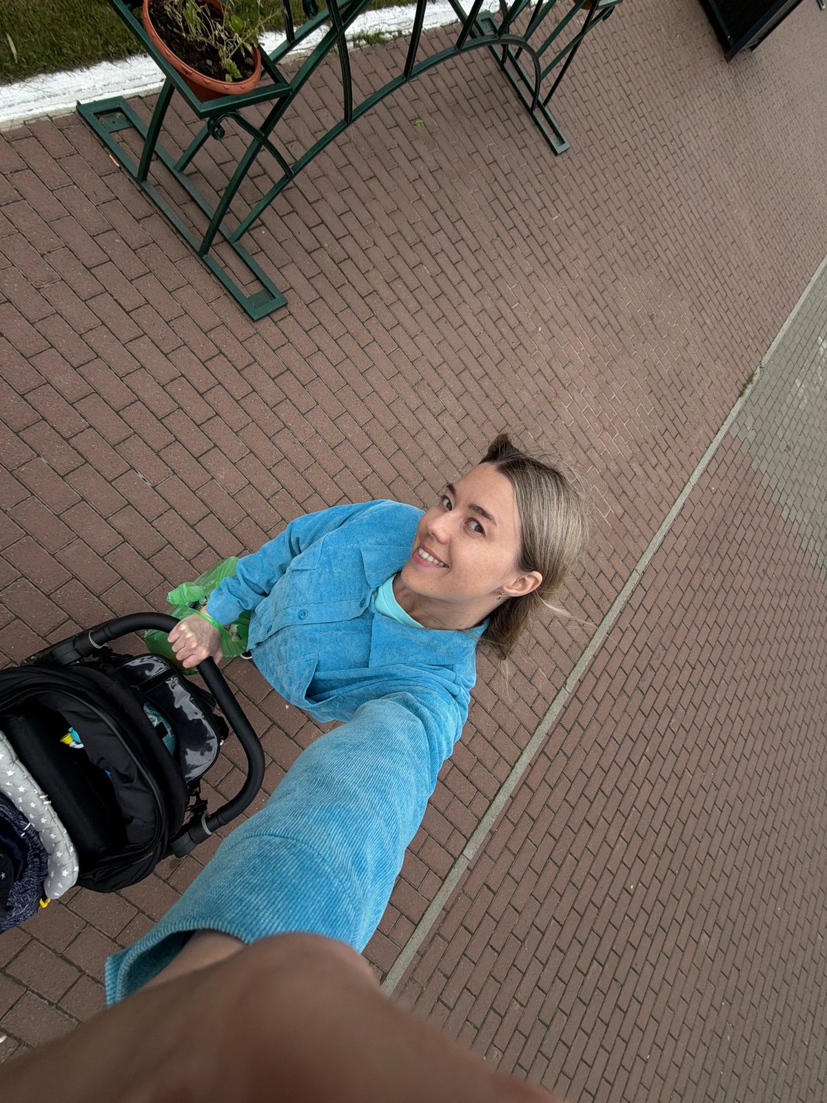 Woman documents afternoon stroll through Chaikovsky, Russia waterfront and cultural sites