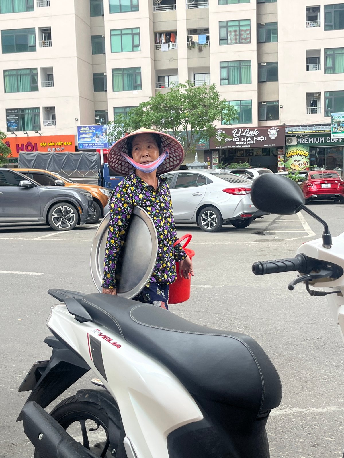 Daily life documented in Vietnamese urban district over hour