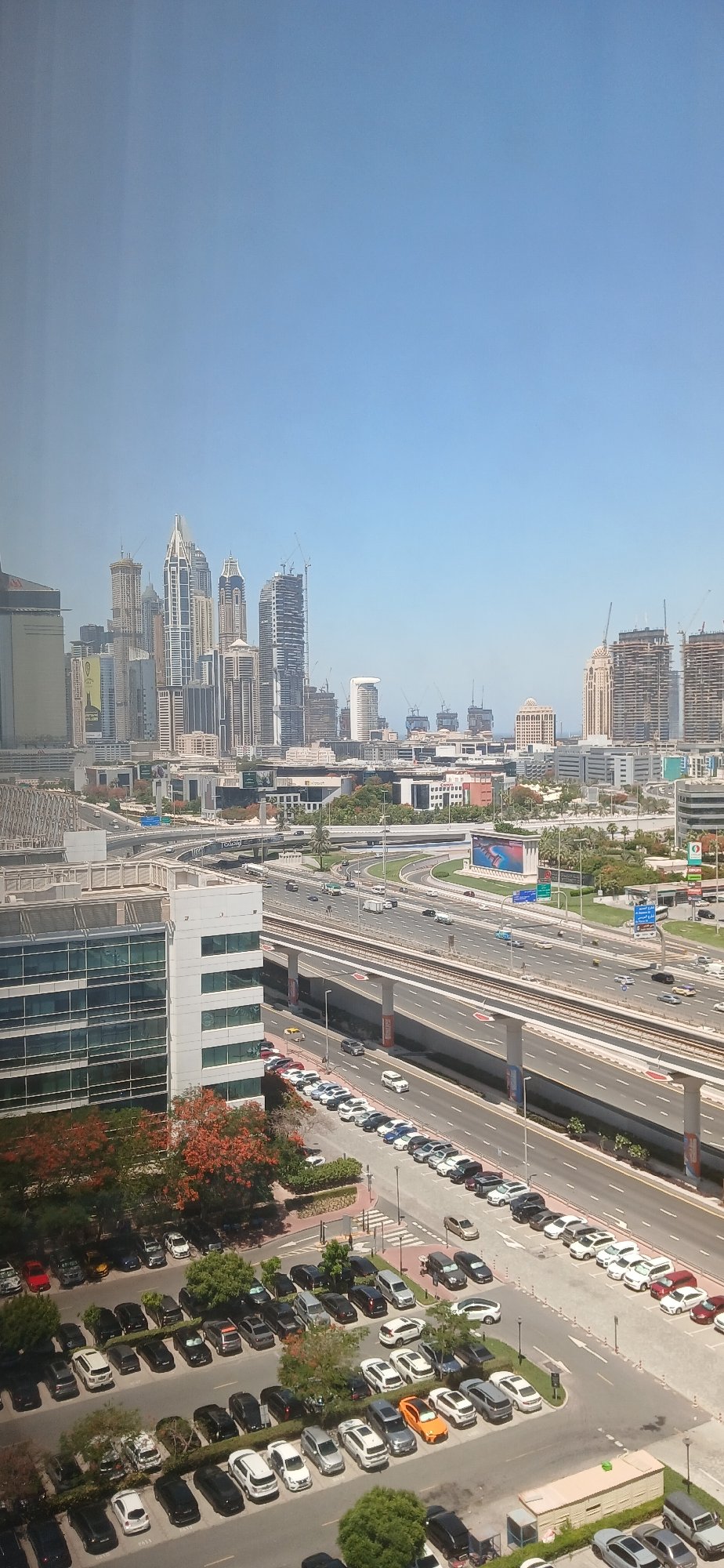 Dubai apartment morning, from kitchen clutter to city views